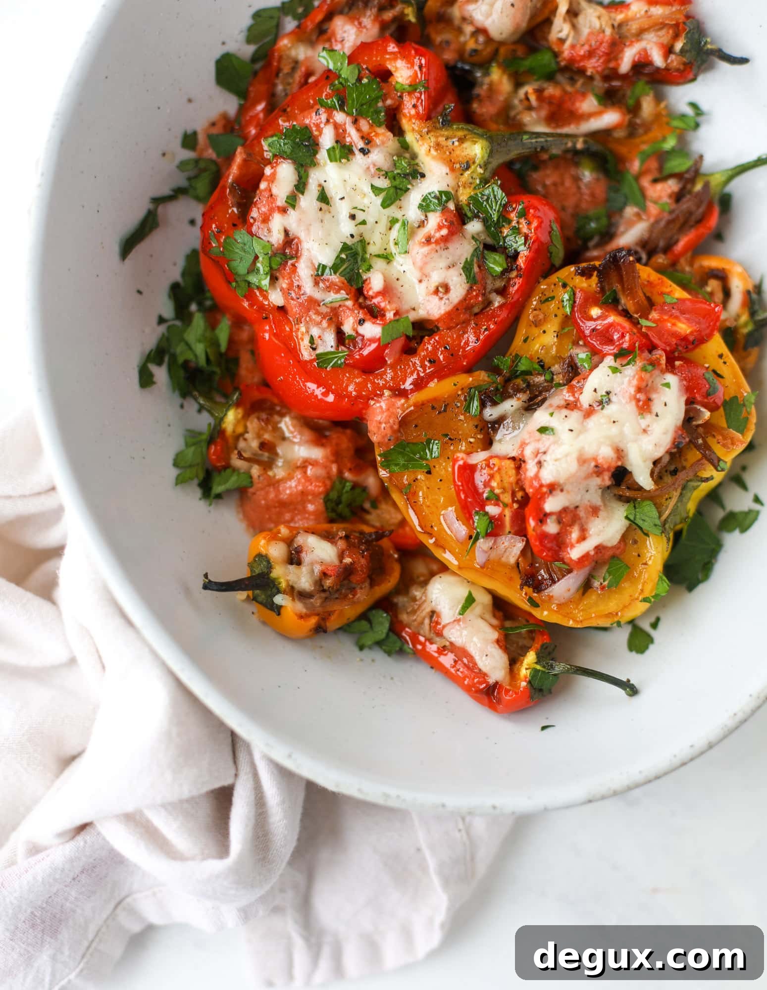 Fire-Roasted Pulled Pork Stuffed Peppers Recipe 10 These pulled pork stuffed peppers are a delicious dinner idea for any weeknight! They work great with leftover pulled pork and the filling is totally customizable. They are flavorful, come together quickly and always a crowd pleaser! I howsweeteats.com #pulledpork #stuffedpeppers