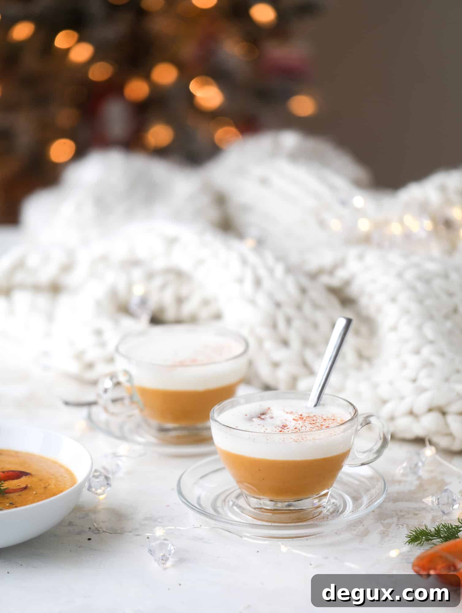 This lobster bisque recipe is delicious, easy and always a crowd pleaser! It's so simple to make at home and it's a rich, decadent treat to serve your family. I also show you how to make a lobster cappuccino, which is lobster bisque with foamed cream! I howsweeteats.com #lobster #bisque