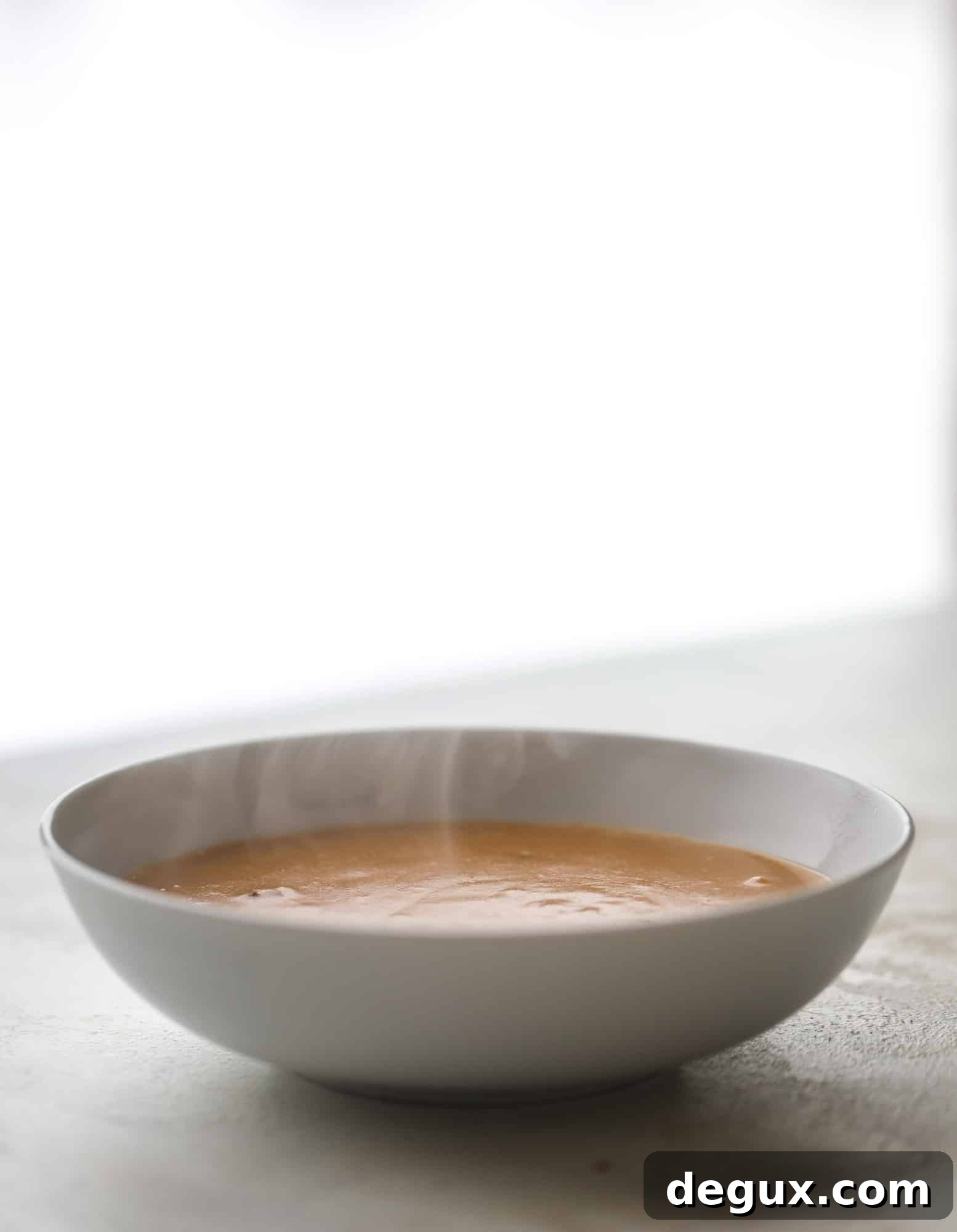 This lobster bisque recipe is delicious, easy and always a crowd pleaser! It's so simple to make at home and it's a rich, decadent treat to serve your family. I also show you how to make a lobster cappuccino, which is lobster bisque with foamed cream! I howsweeteats.com #lobster #bisque