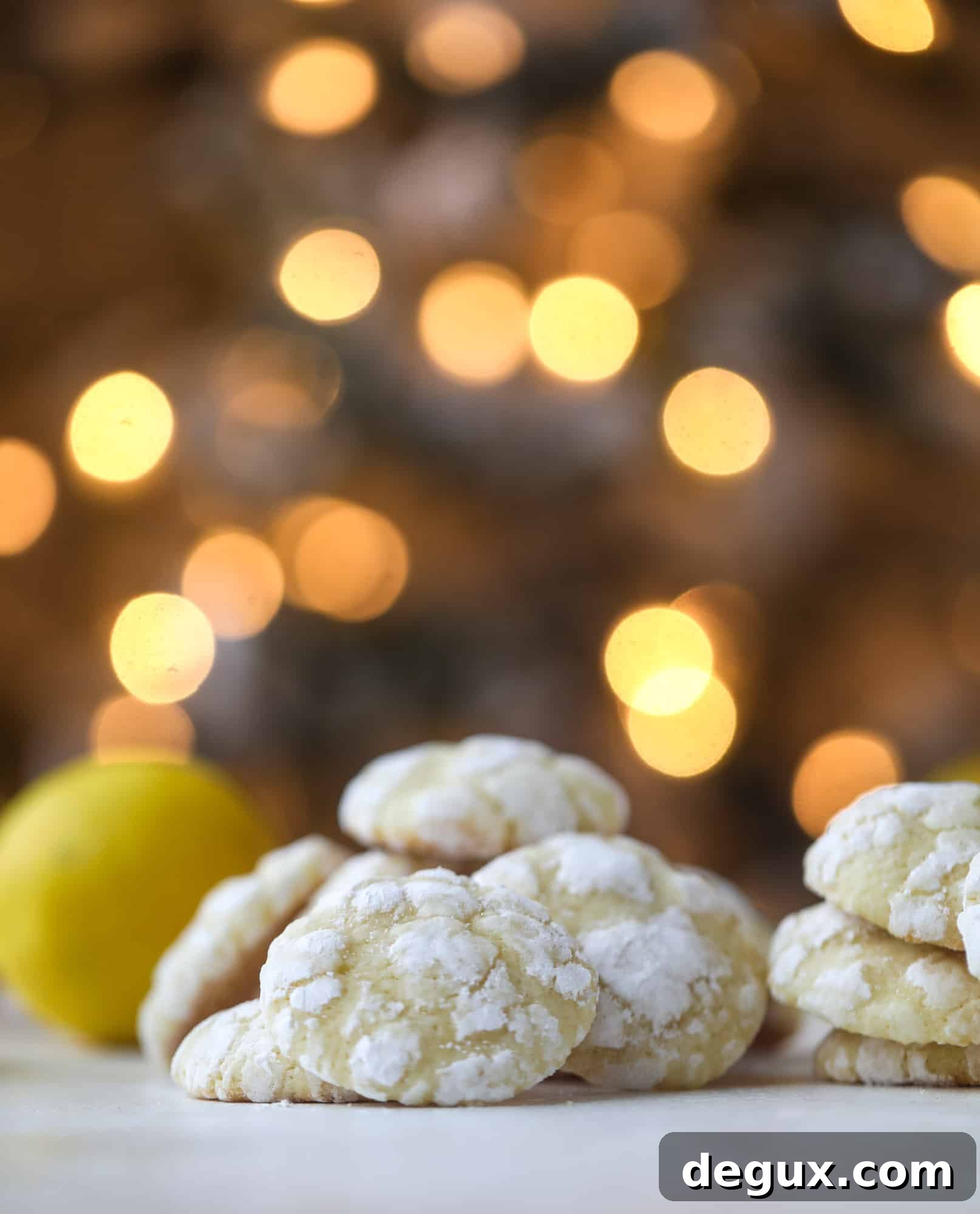 Lemon crinkle cookies on a plate.