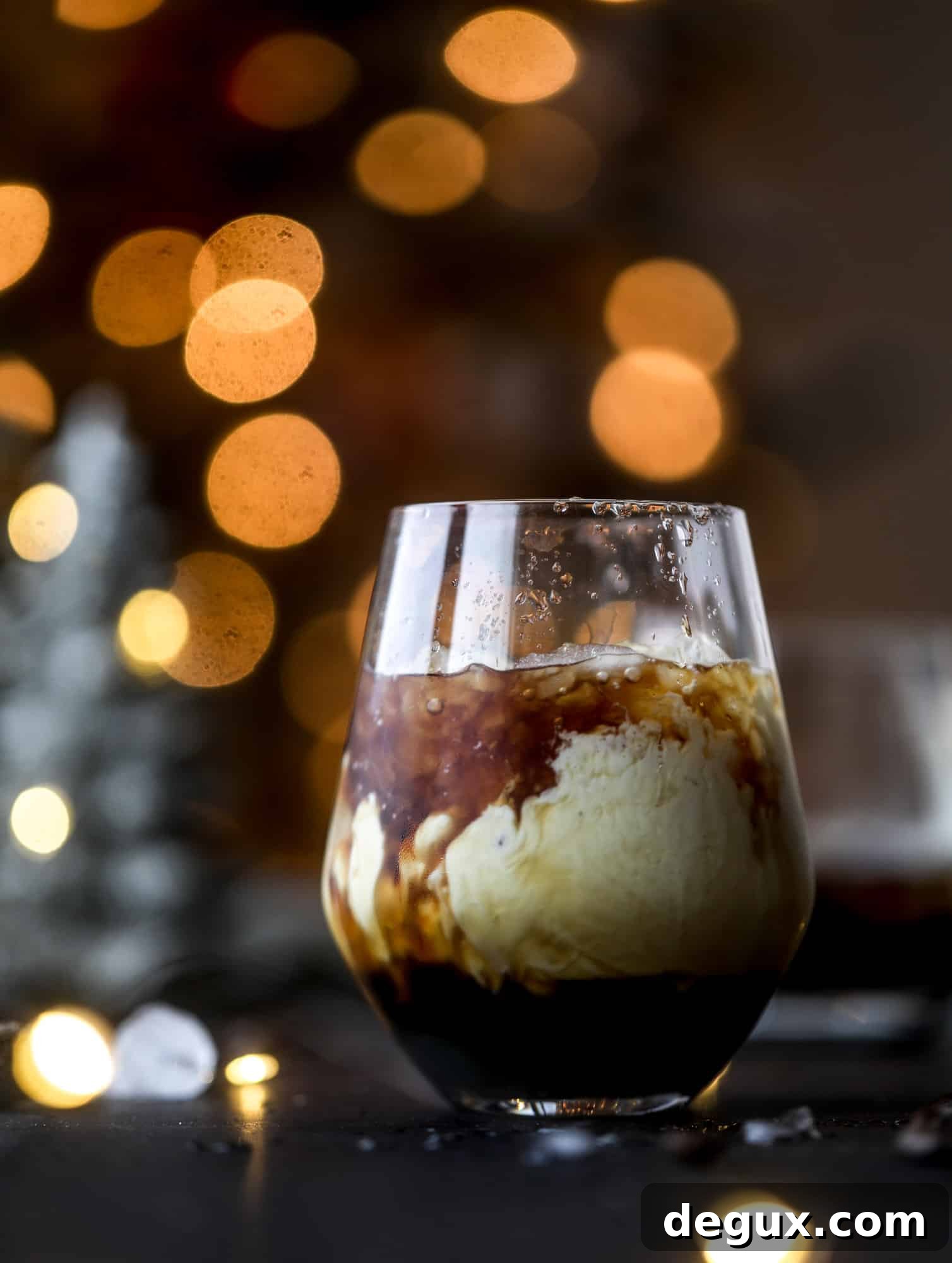 Eggnog White Russian Cocktail Recipe — Festive Holiday Drink 3 The eggnog white russian cocktail is perfect for the holiday season! Coffee liqueur mixed with vanilla vodka and eggnog and topped with freshly grated nutmeg is the perfect treat and oh-so festive! I howsweeteats.com #eggnog #whiterussian