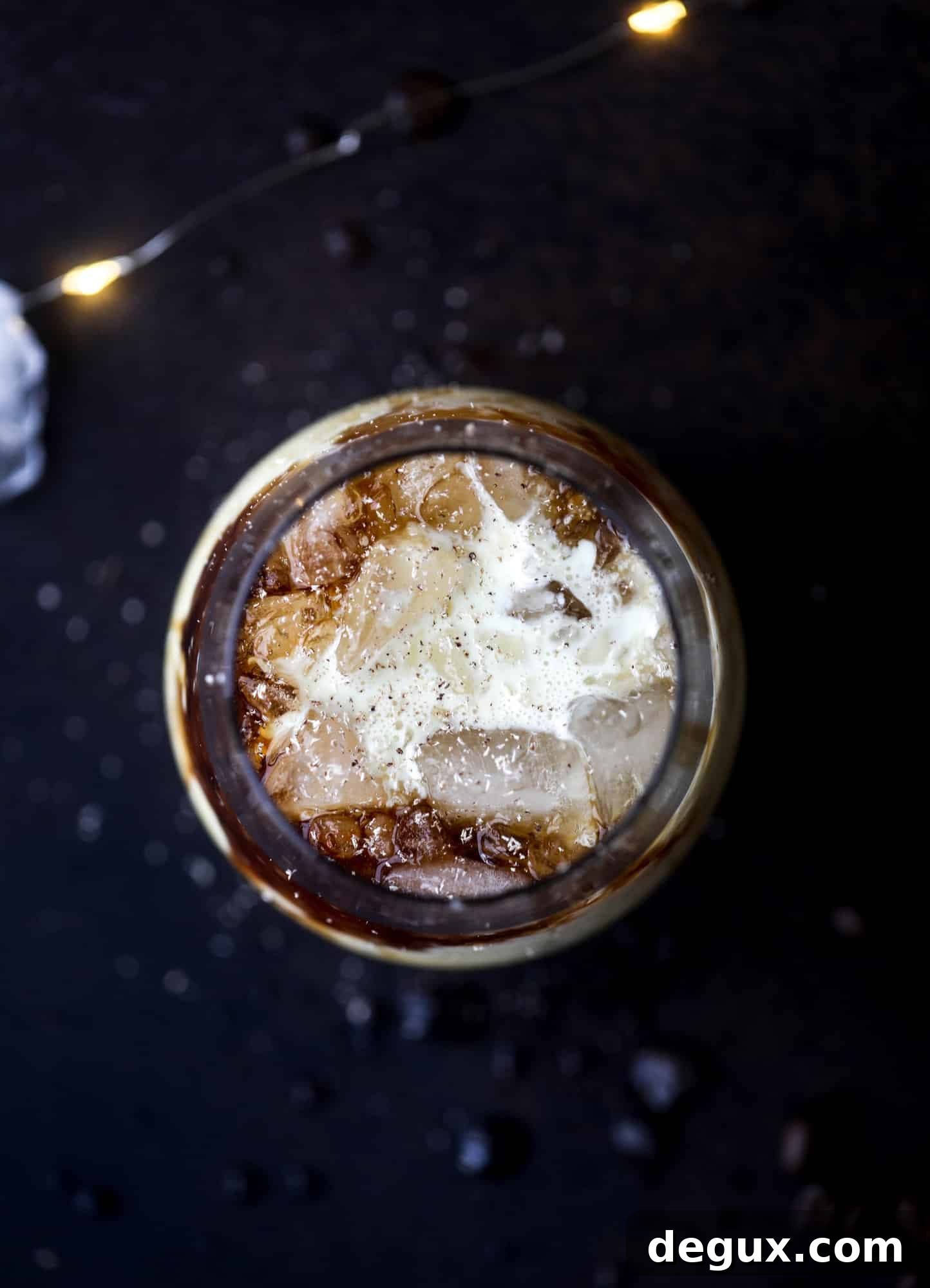 Eggnog White Russian Cocktail Recipe — Festive Holiday Drink 4 The eggnog white russian cocktail is perfect for the holiday season! Coffee liqueur mixed with vanilla vodka and eggnog and topped with freshly grated nutmeg is the perfect treat and oh-so festive! I howsweeteats.com #eggnog #whiterussian