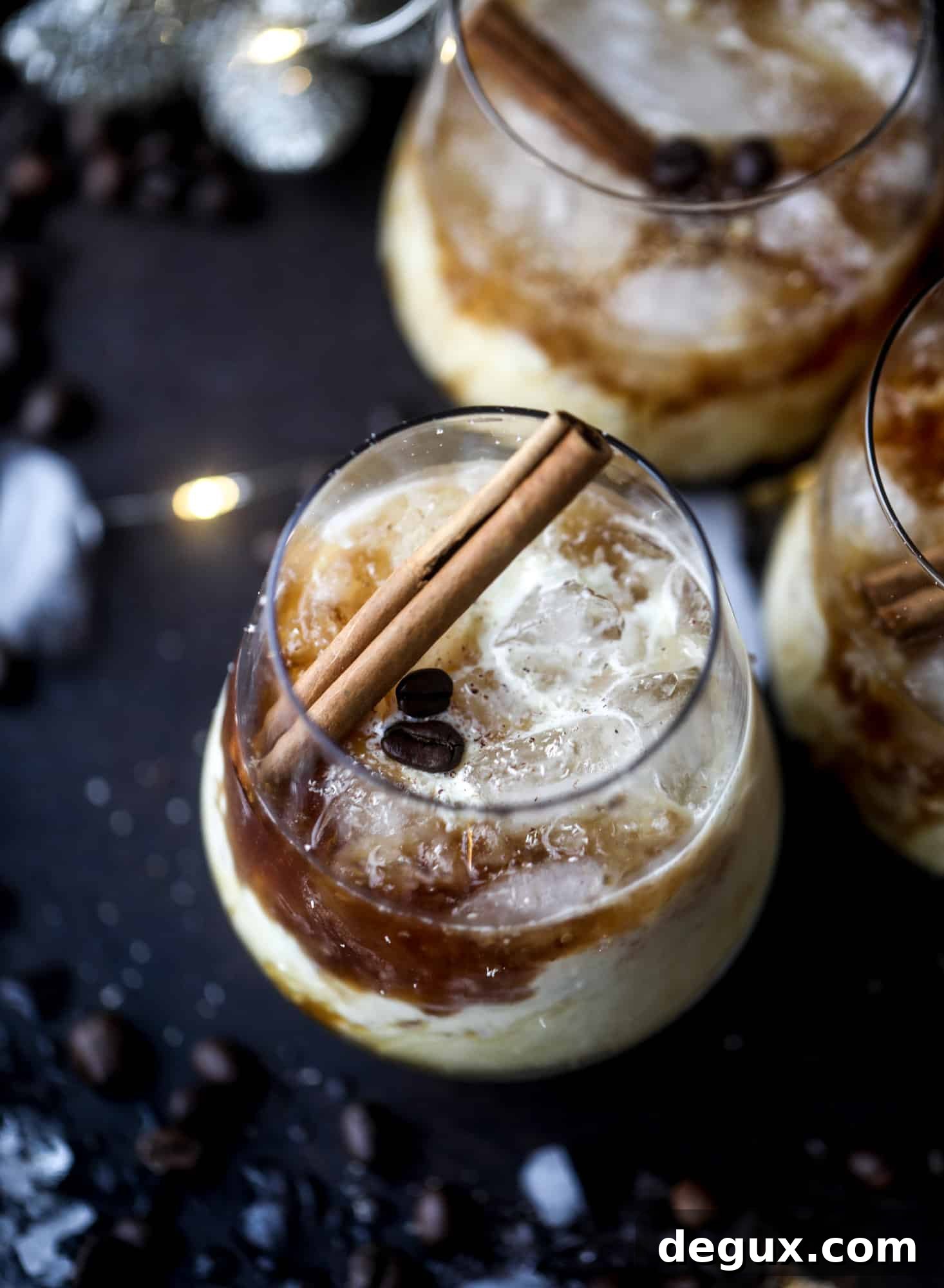 Eggnog White Russian Cocktail Recipe — Festive Holiday Drink 6 The eggnog white russian cocktail is perfect for the holiday season! Coffee liqueur mixed with vanilla vodka and eggnog and topped with freshly grated nutmeg is the perfect treat and oh-so festive! I howsweeteats.com #eggnog #whiterussian