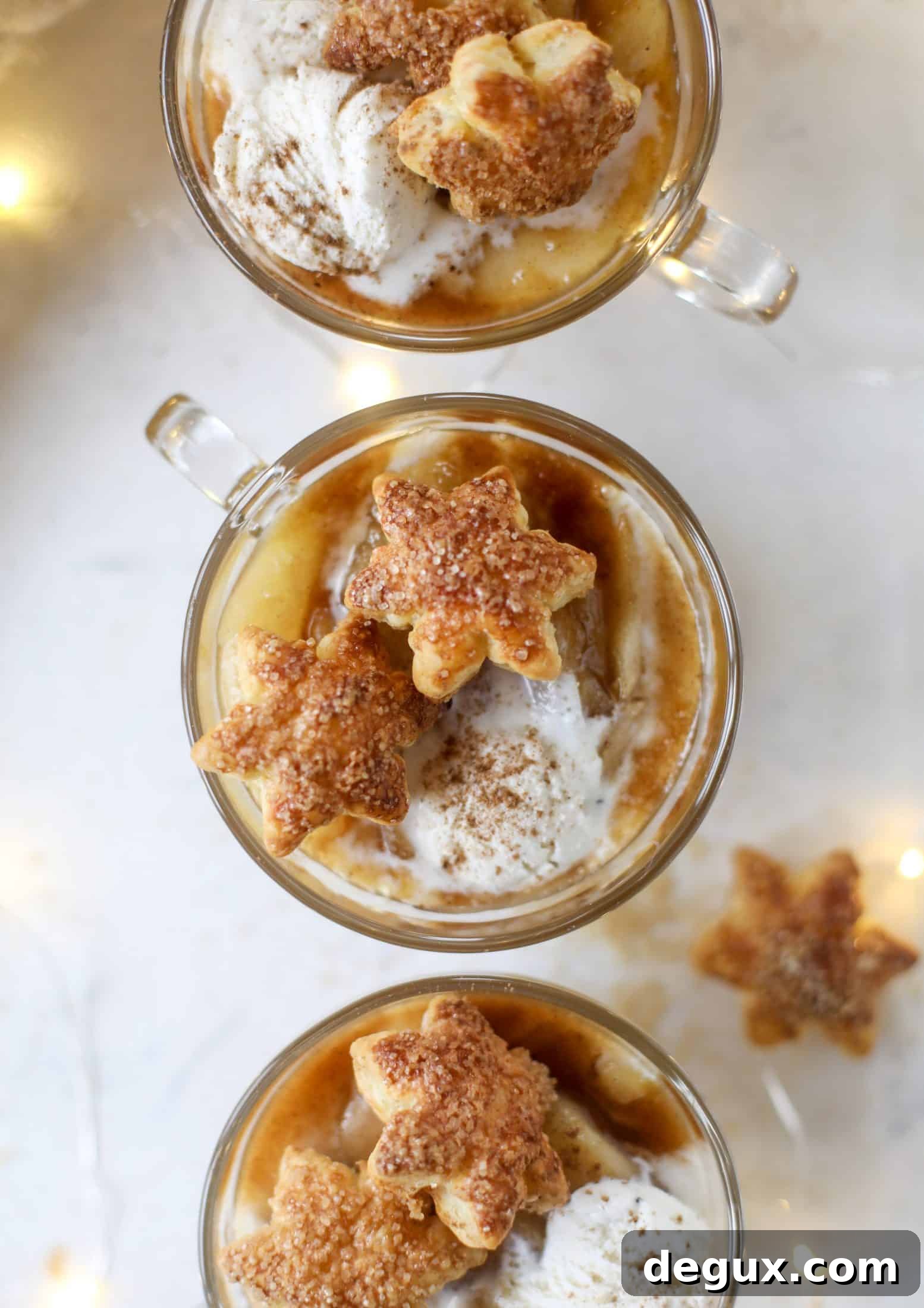 This pear mug pie is the coziest way to enjoy warm, caramelized pears. Topped with vanilla ice cream and quick puff pastry stars.