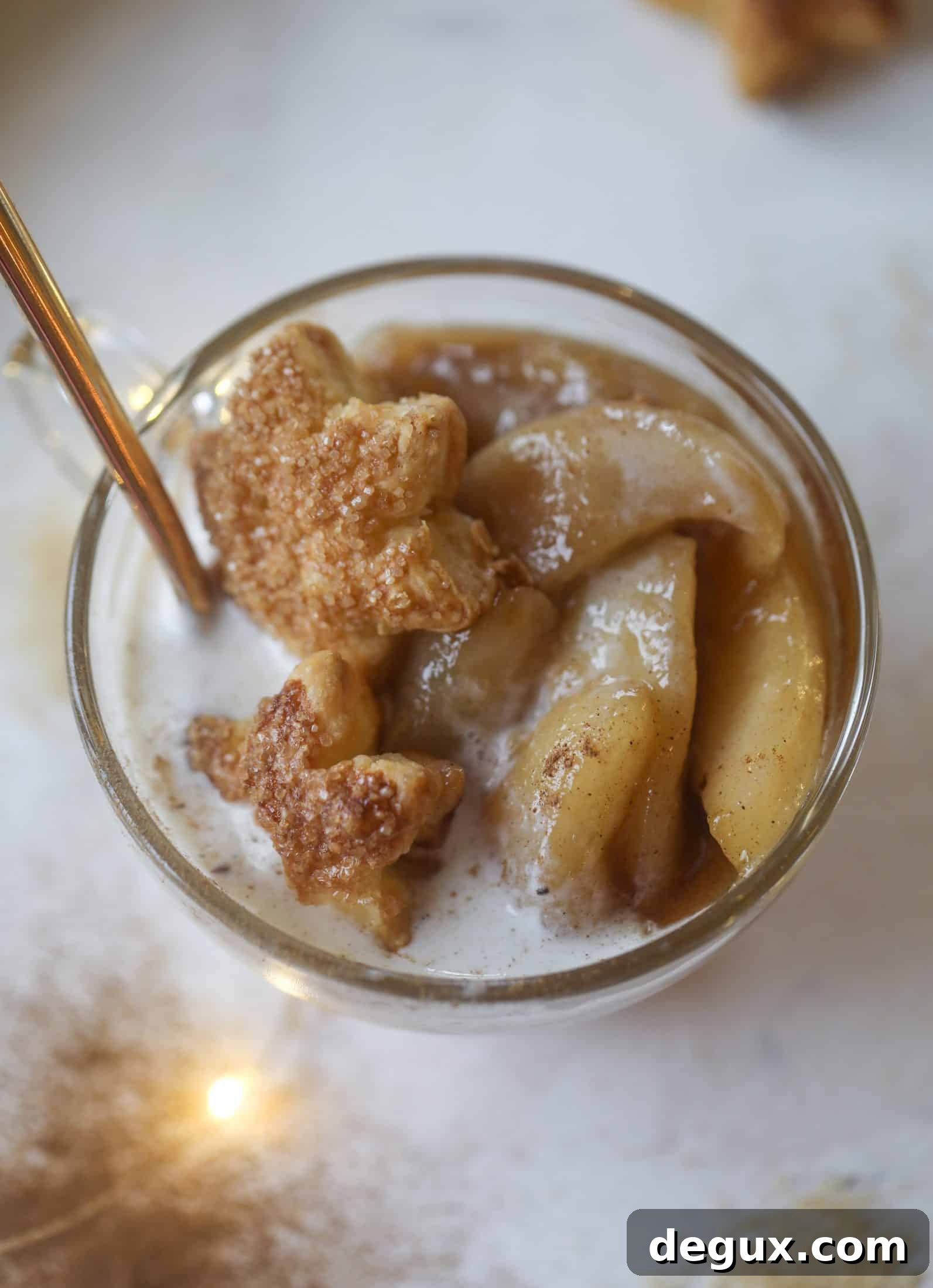 Pear mug pie with melting ice cream.