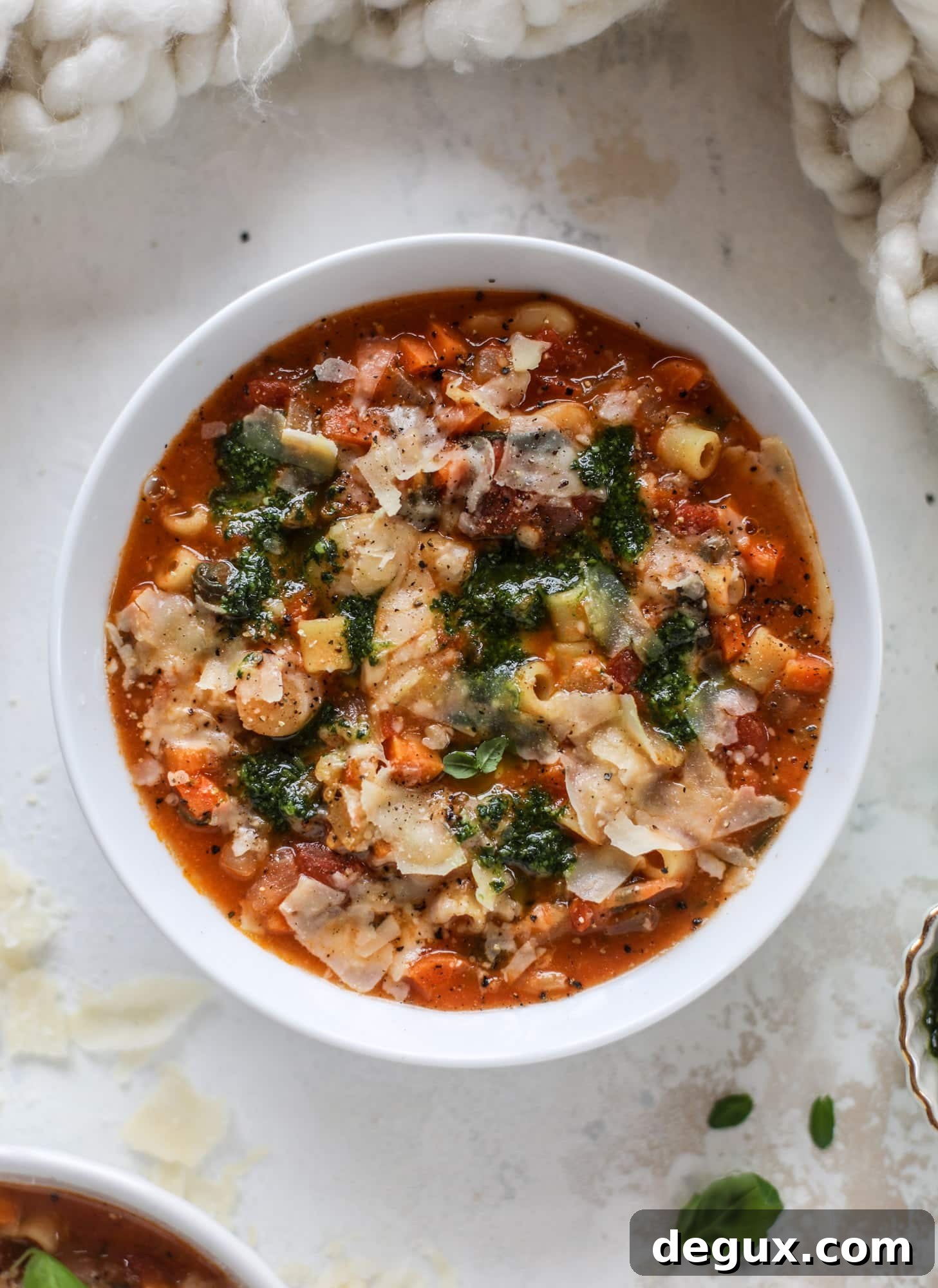 Fire-Roasted Minestrone with Kale Pesto Recipe 7 This fire roasted minestrone soup is like a hug in a bowl. Chock full of vegetables, fire roasted tomatoes and butter beans, the bowl is topped off with a delicious kale pesto that adds even more flavor. Satisfying, healthy and perfect for dinner!
