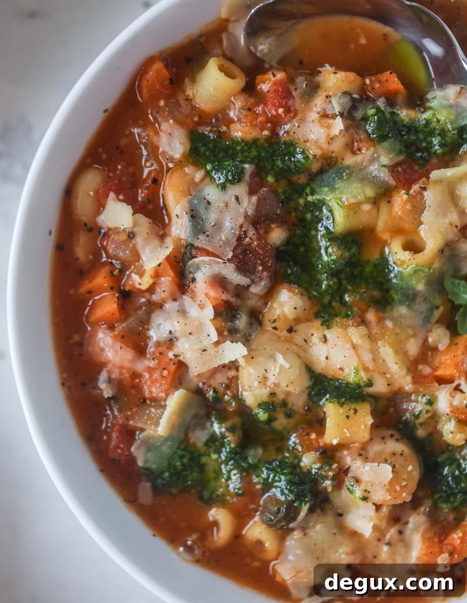 Fire-Roasted Minestrone with Kale Pesto Recipe 9 This fire roasted minestrone soup is like a hug in a bowl. Chock full of vegetables, fire roasted tomatoes and butter beans, the bowl is topped off with a delicious kale pesto that adds even more flavor. Satisfying, healthy and perfect for dinner!