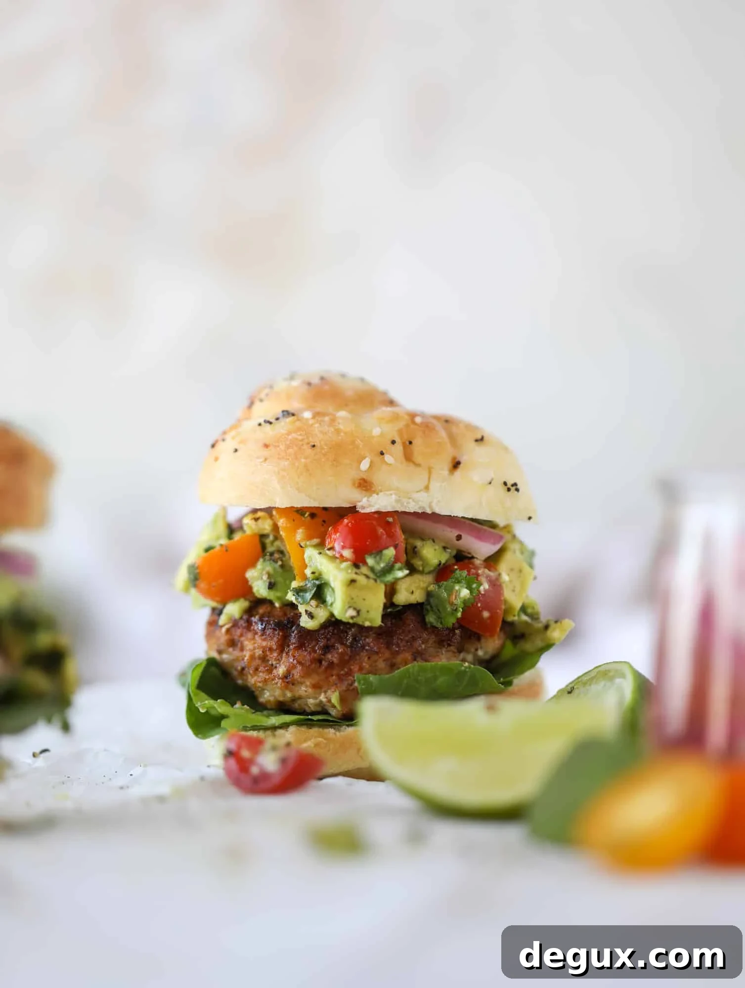 Guacamole-Stuffed Turkey Burgers with Lime Cilantro Flavor 6 These turkey burgers are full of flavor and topped with a delicious chunky guacamole to take the flavor over the top. The perfect easy dinner! I howsweeteats.com #turkey #burgers