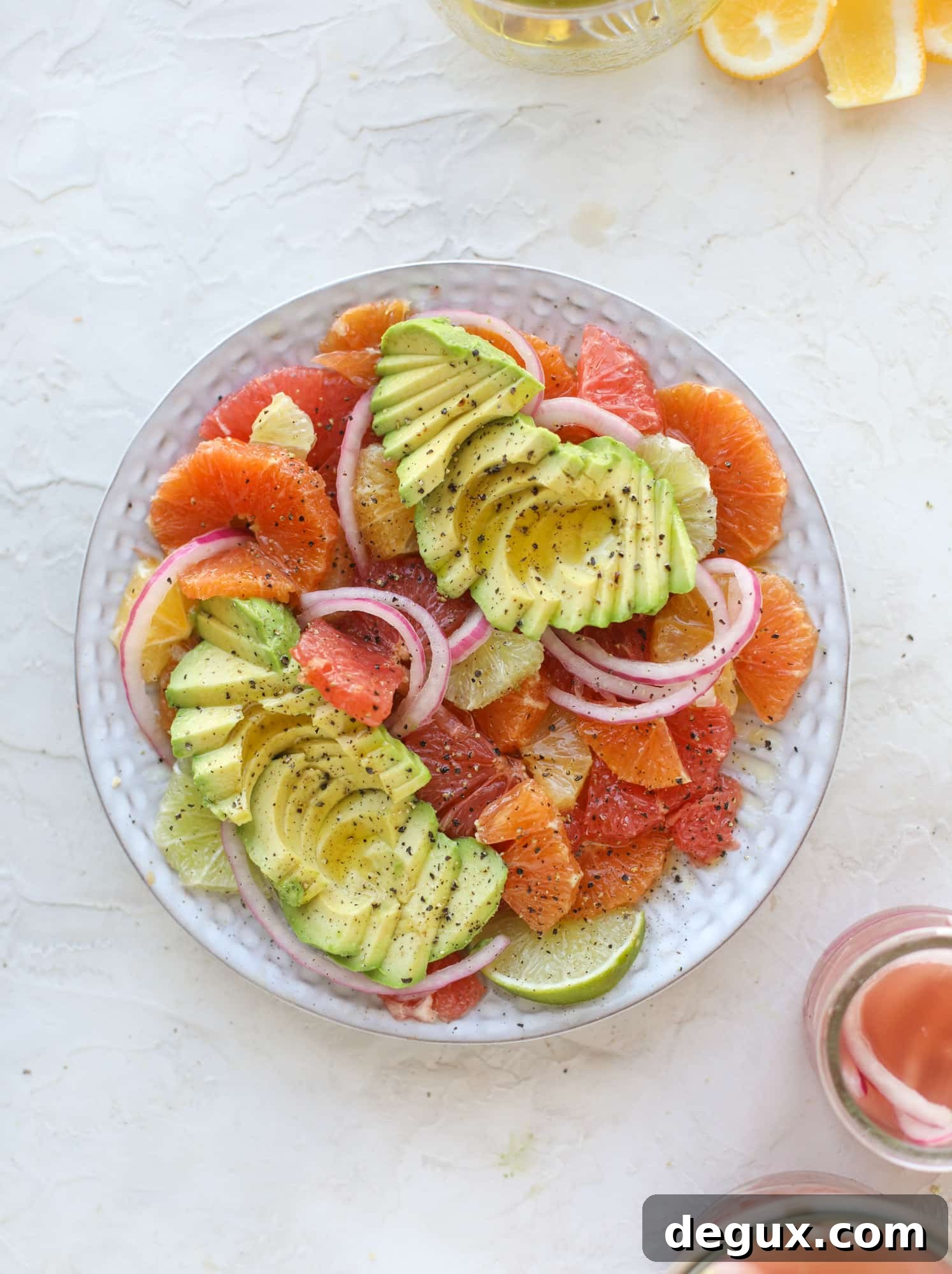 Avocado and Citrus Salad: Fresh Side Dish for Sunday Meals 2 A deliciously fresh and invigorating avocado citrus salad with honey lime vinaigrette. It's creamy, tart, sweet and refreshing! I howsweeteats.com #avocado #citrussalad