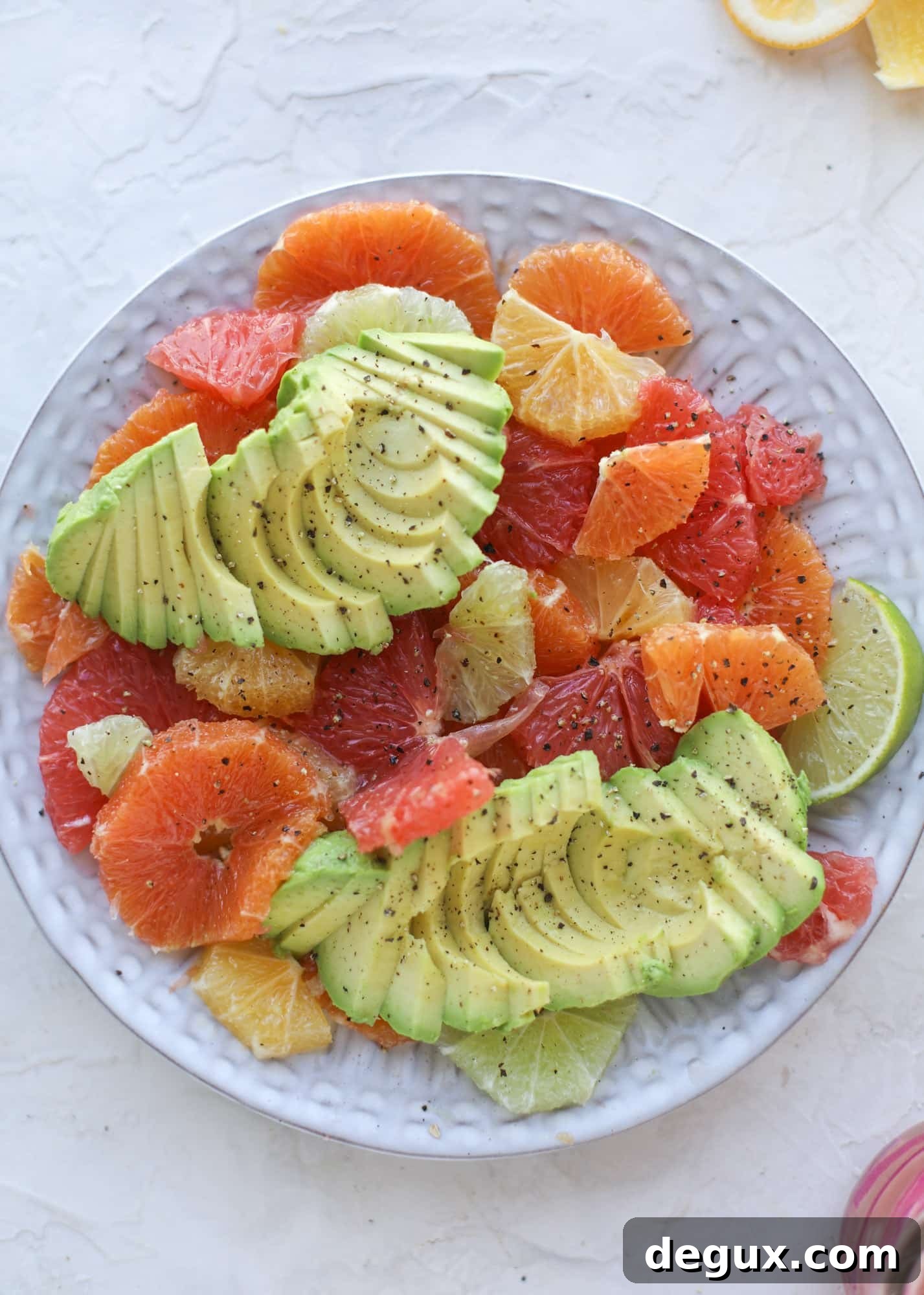 Avocado and Citrus Salad: Fresh Side Dish for Sunday Meals 4 A deliciously fresh and invigorating avocado citrus salad with honey lime vinaigrette. It's creamy, tart, sweet and refreshing! I howsweeteats.com #avocado #citrussalad