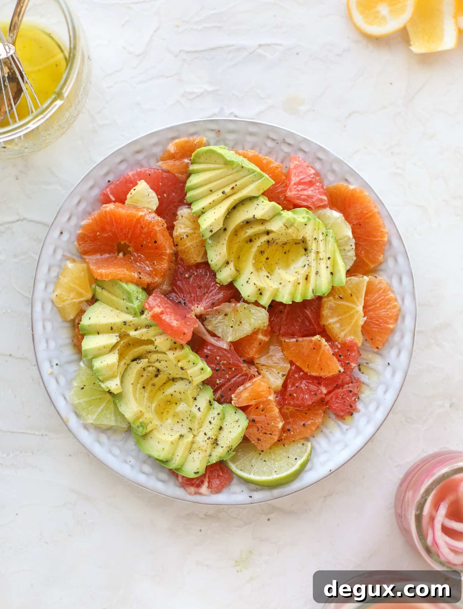 Avocado and Citrus Salad: Fresh Side Dish for Sunday Meals 7 A deliciously fresh and invigorating avocado citrus salad with honey lime vinaigrette. It's creamy, tart, sweet and refreshing! I howsweeteats.com #avocado #citrussalad