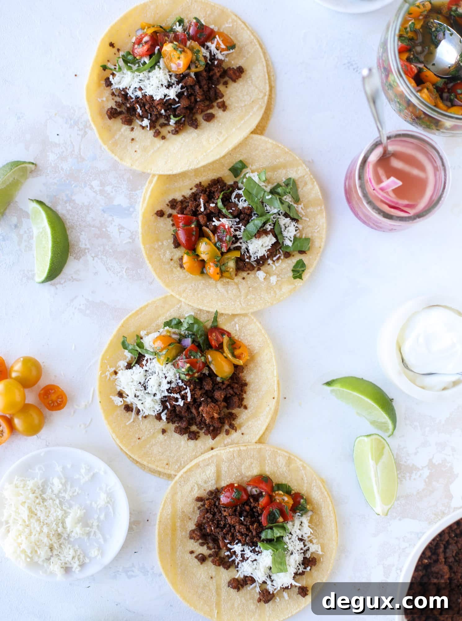 Weeknight ground beef tacos that are anything like the 90s! These are made with a homemade taco seasoning and served with the perfect toppings!