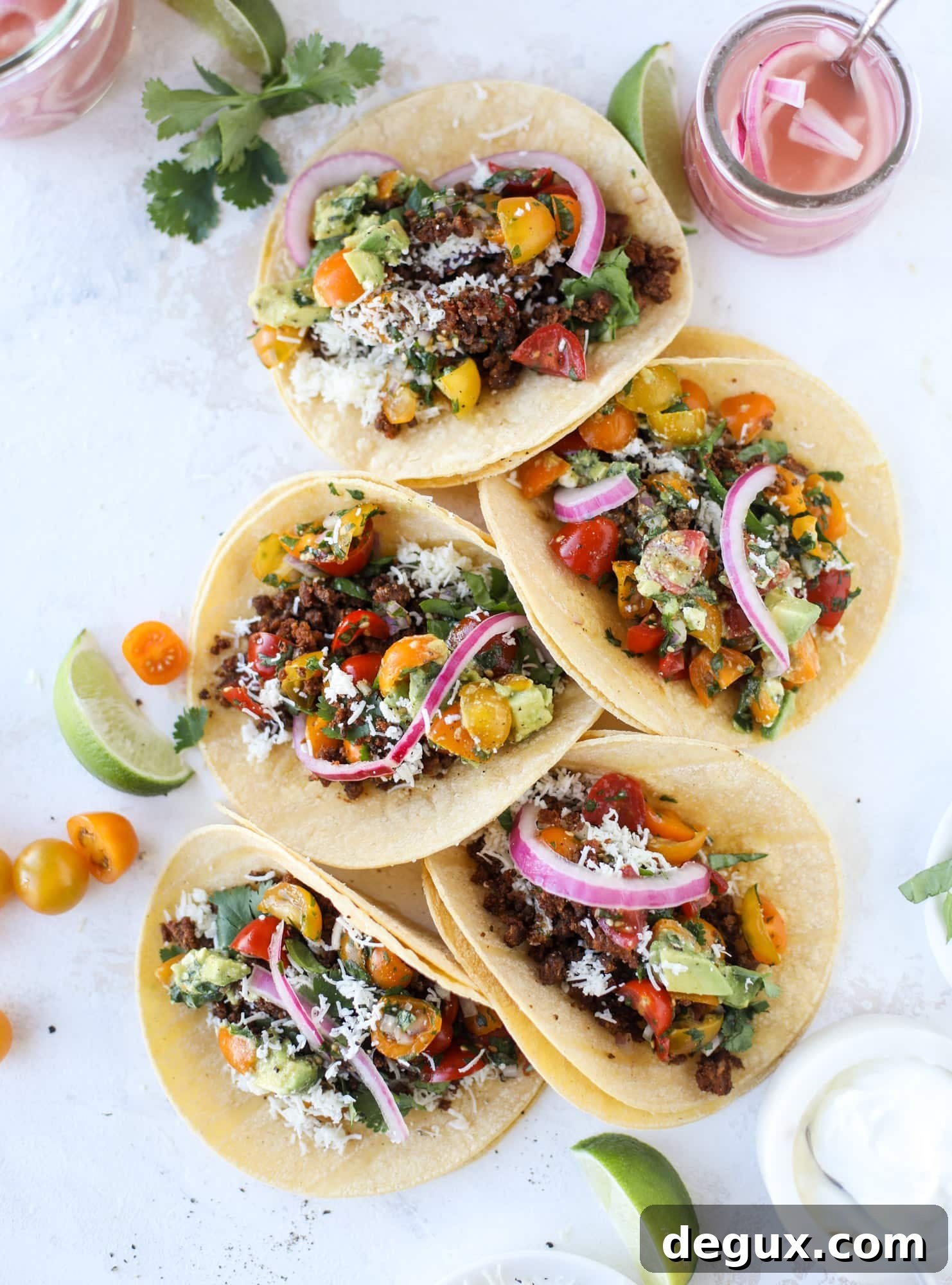 Weeknight ground beef tacos that are anything like the 90s! These are made with a homemade taco seasoning and served with the perfect toppings!
