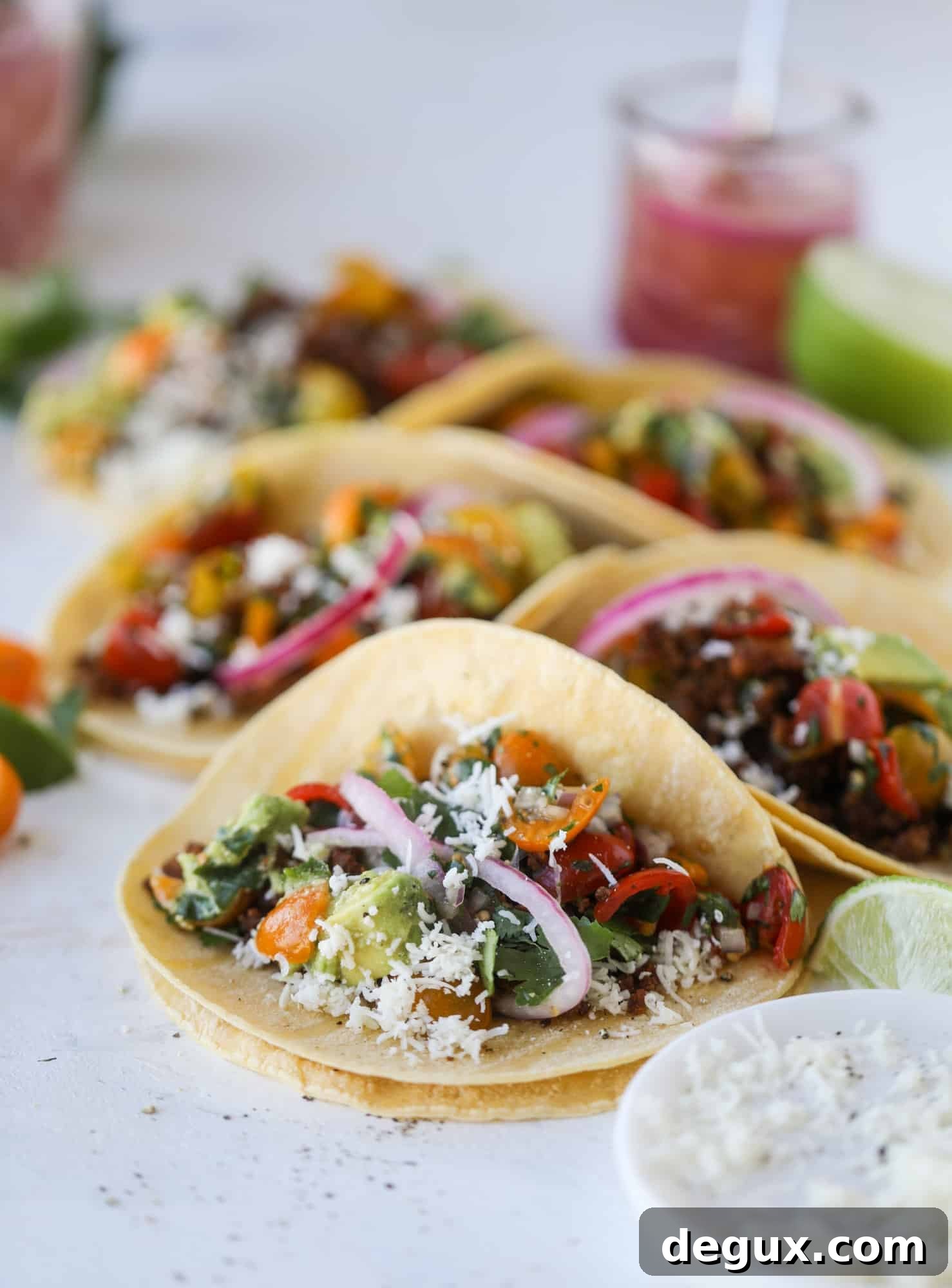 Weeknight ground beef tacos that are anything like the 90s! These are made with a homemade taco seasoning and served with the perfect toppings!