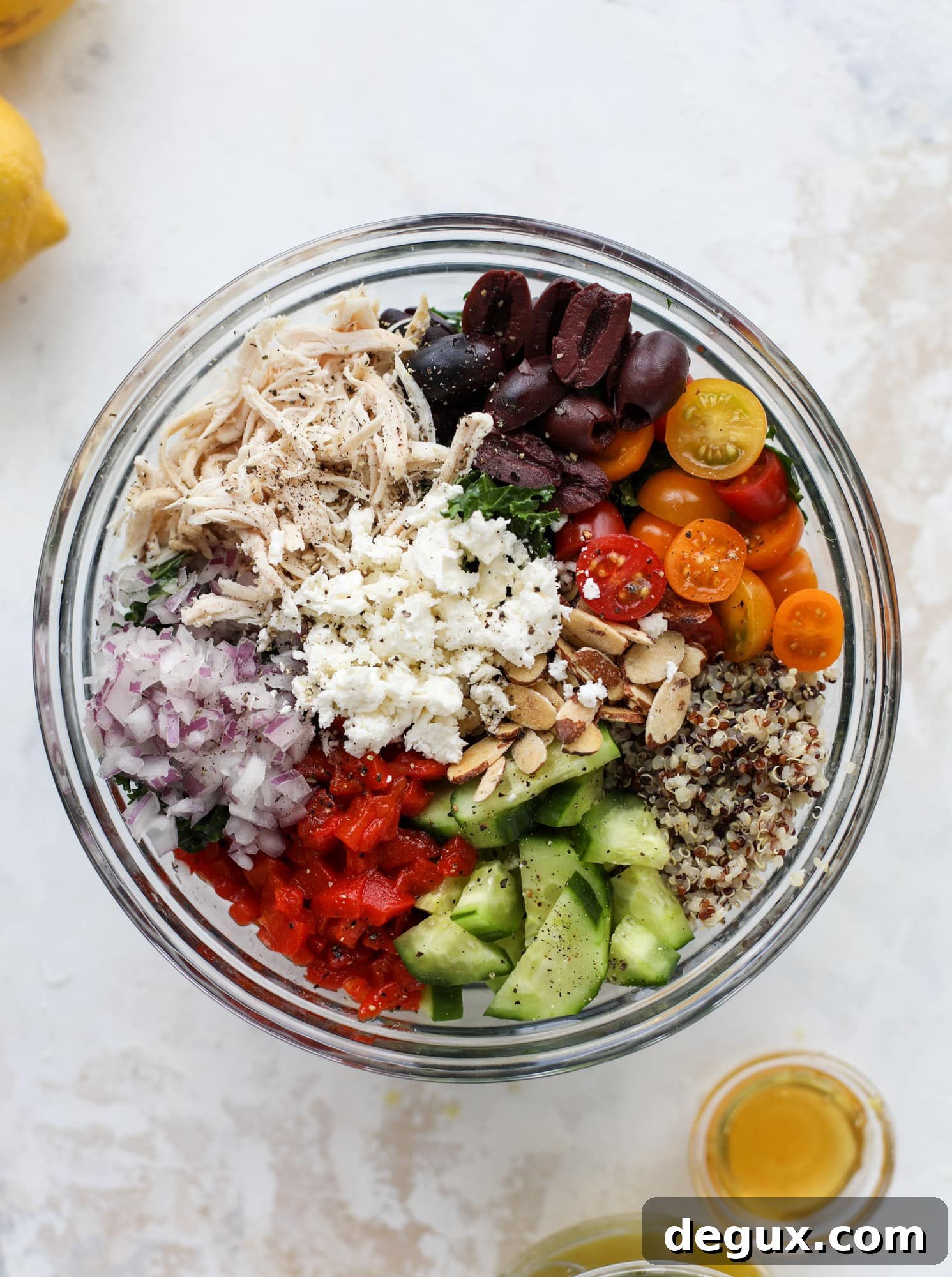 Mediterranean Kale and Quinoa Chicken Salad with Lemon Vinaigrette 3 This mediterranean kale and quinoa salad is a copycat for the delicious Panera Bread Modern Greek Salad with Chicken. Super easy and satisfying! I howsweeteats.com #mediterranean #kalesalad