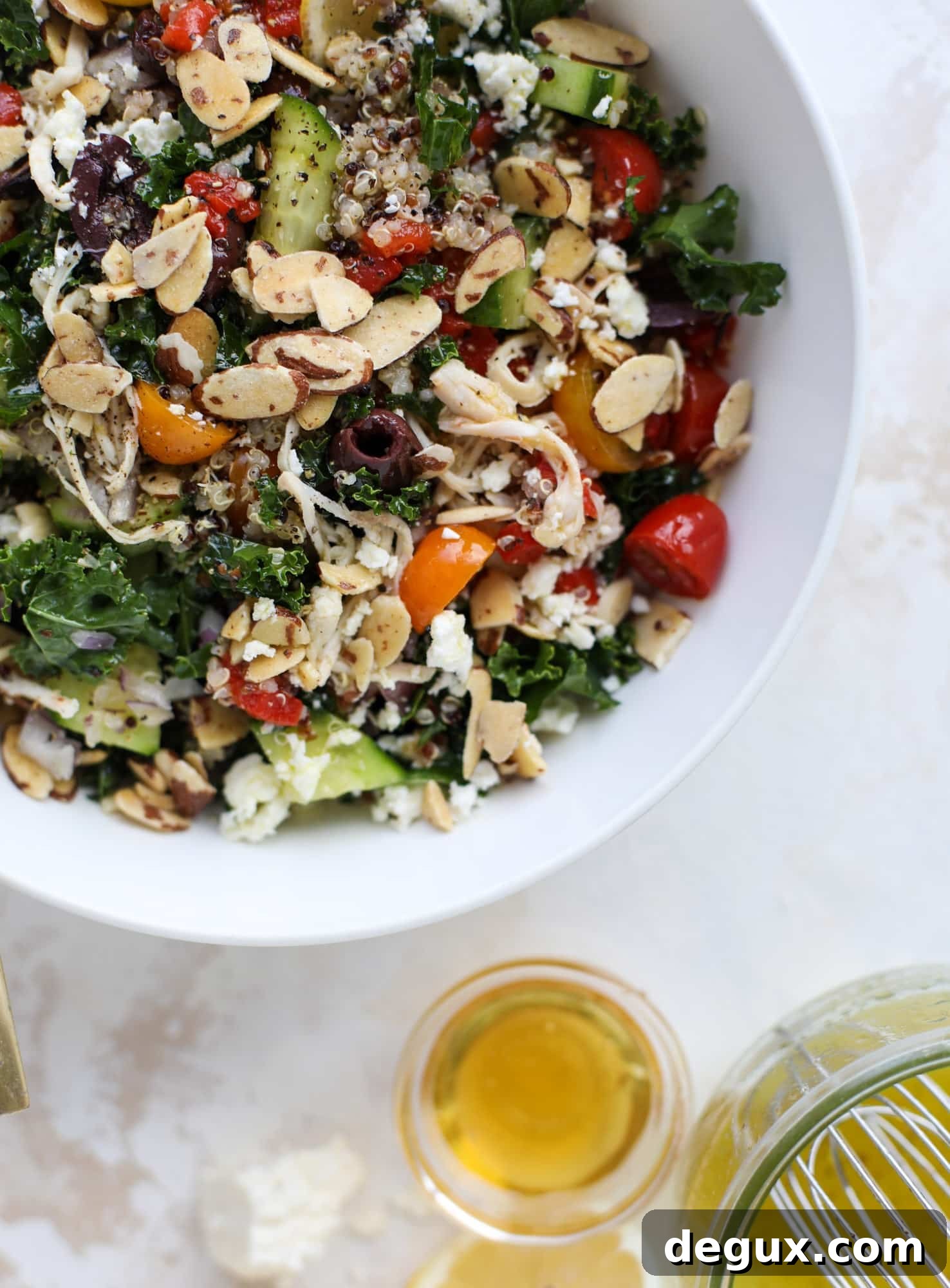 Mediterranean Kale and Quinoa Chicken Salad with Lemon Vinaigrette 7 This mediterranean kale and quinoa salad is a copycat for the delicious Panera Bread Modern Greek Salad with Chicken. Super easy and satisfying! I howsweeteats.com #mediterranean #kalesalad