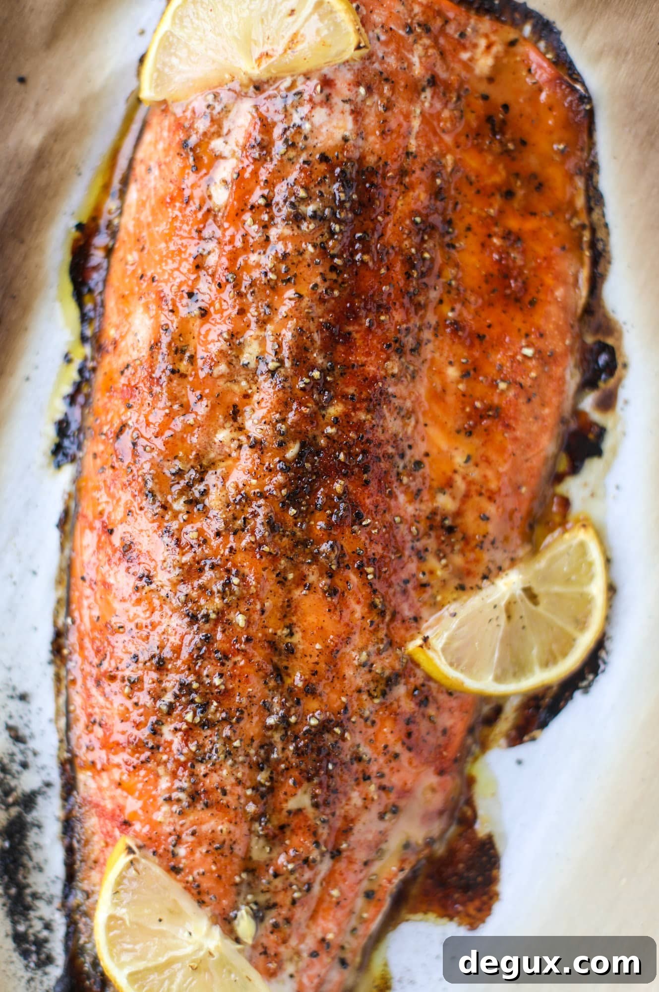 Spicy Honey-Glazed Roasted Salmon Recipe 5 This hot honey salmon is flaky and buttery with a hint of heat and a spritz of lemon. It's an easy weeknight meal and is delicious on salads for lunch!