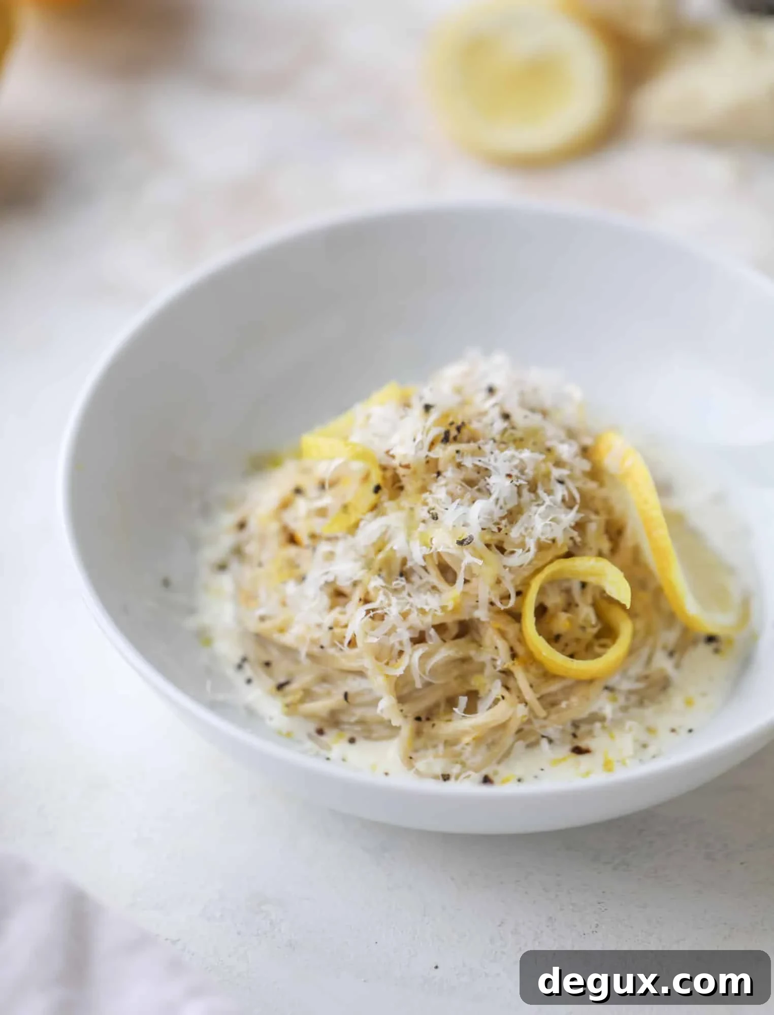 This cozy lemon pasta is light, refreshing and perfect for dinner when paired with a simple greens salad. It comes together in 20 minutes! I howsweeteats.com #lemon #pasta