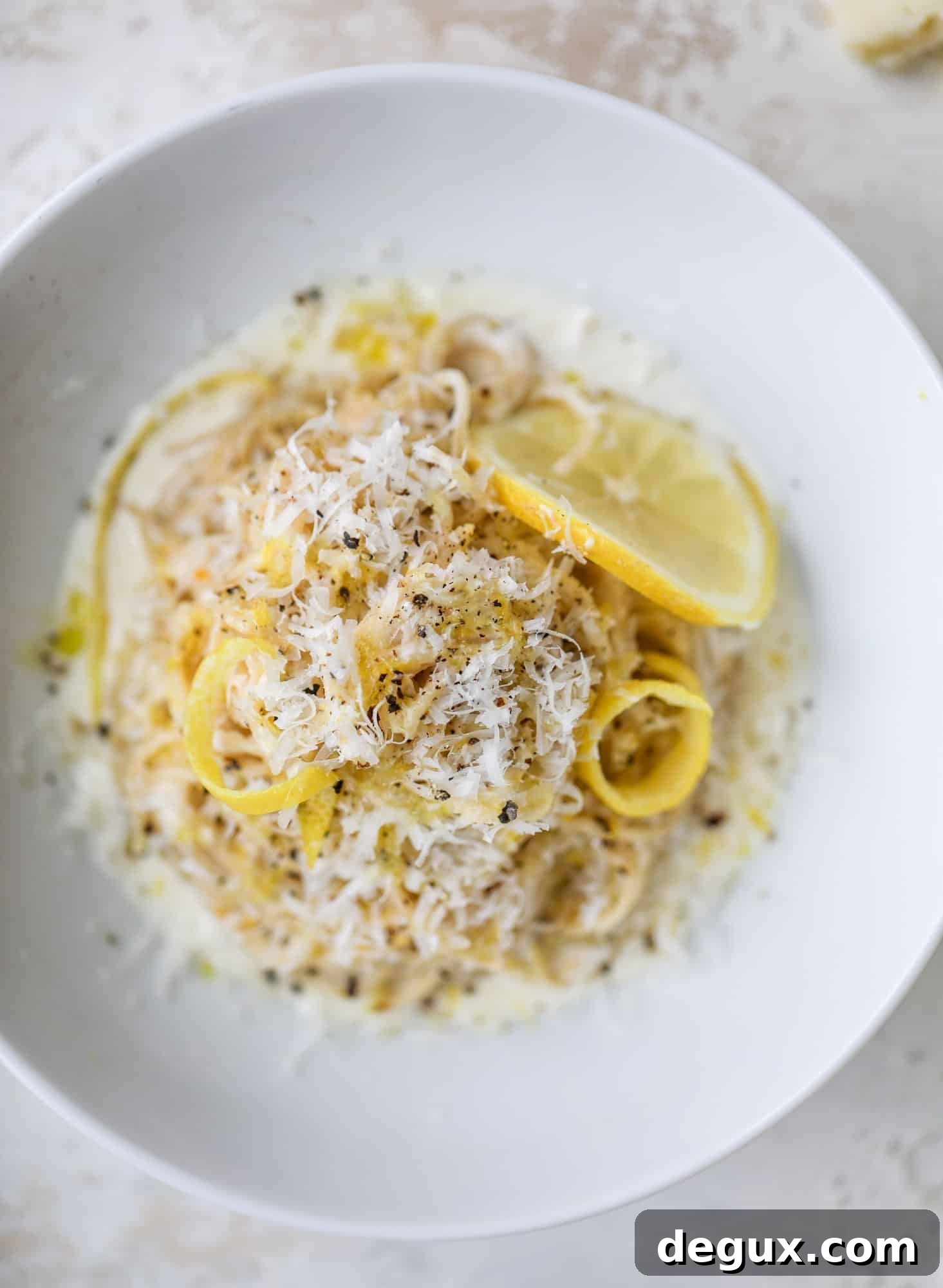 Cozy Lemon Pasta Bowl Recipe for Creamy, Zesty Comfort 7 This cozy lemon pasta is light, refreshing and perfect for dinner when paired with a simple greens salad. It comes together in 20 minutes! I howsweeteats.com #lemon #pasta