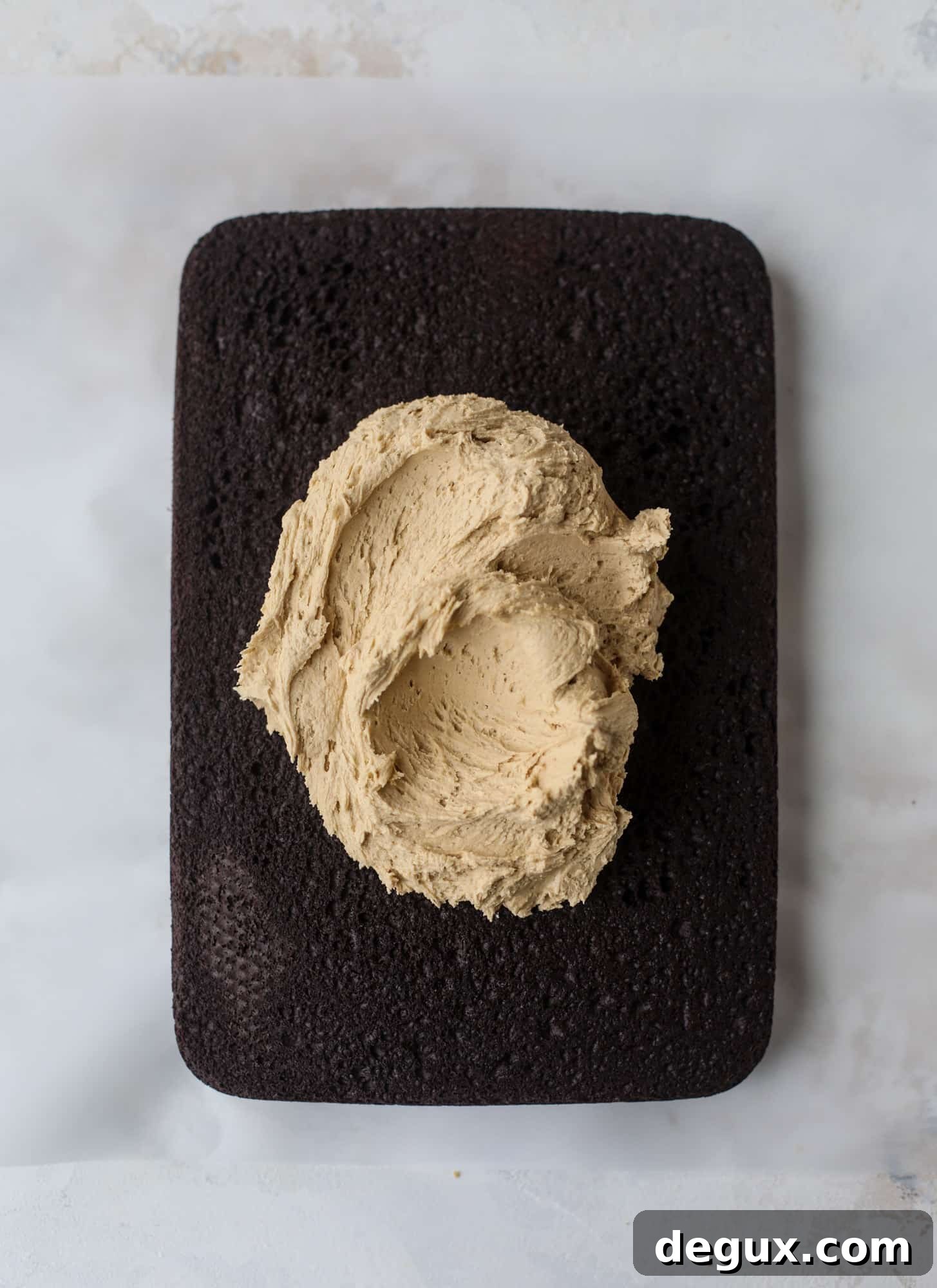 Chocolate Sheet Cake with Creamy Peanut Butter Frosting 4 Easy chocolate peanut butter cake is the way to my heart. Moist chocolate cake, fluffy peanut butter frosting. It's the perfect dessert, anytime! I howsweeteats.com #chocolatepeanutbutter #cake