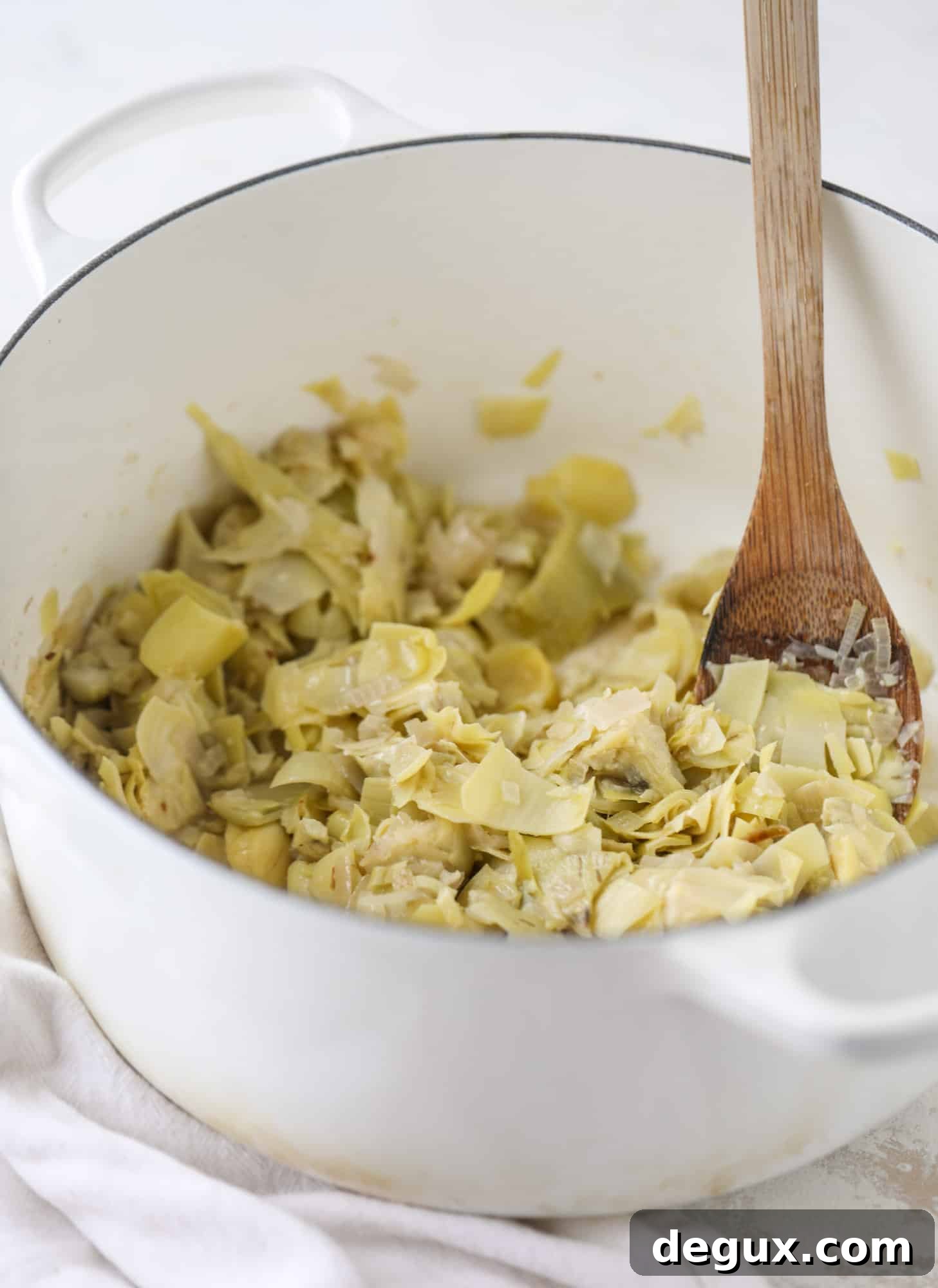 This creamy artichoke soup is full of artichoke hearts, cream and crème fraiche. It's rich and hearty but also light in flavor - perfect for late winter.