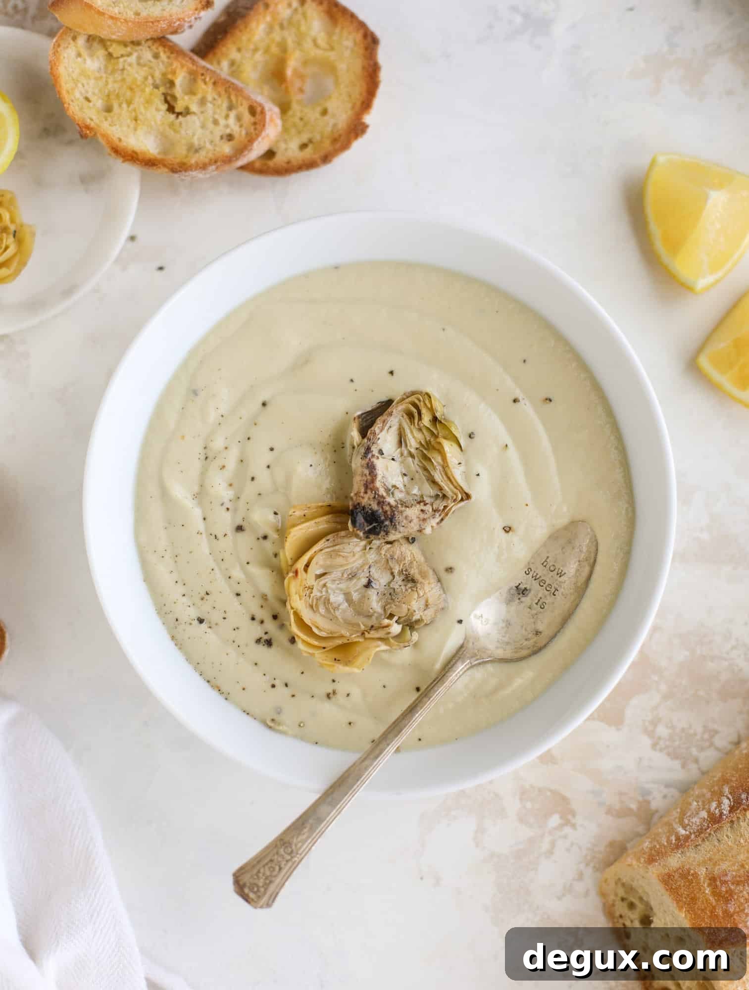 This creamy artichoke soup is full of artichoke hearts, cream and crème fraiche. It's rich and hearty but also light in flavor - perfect for late winter.