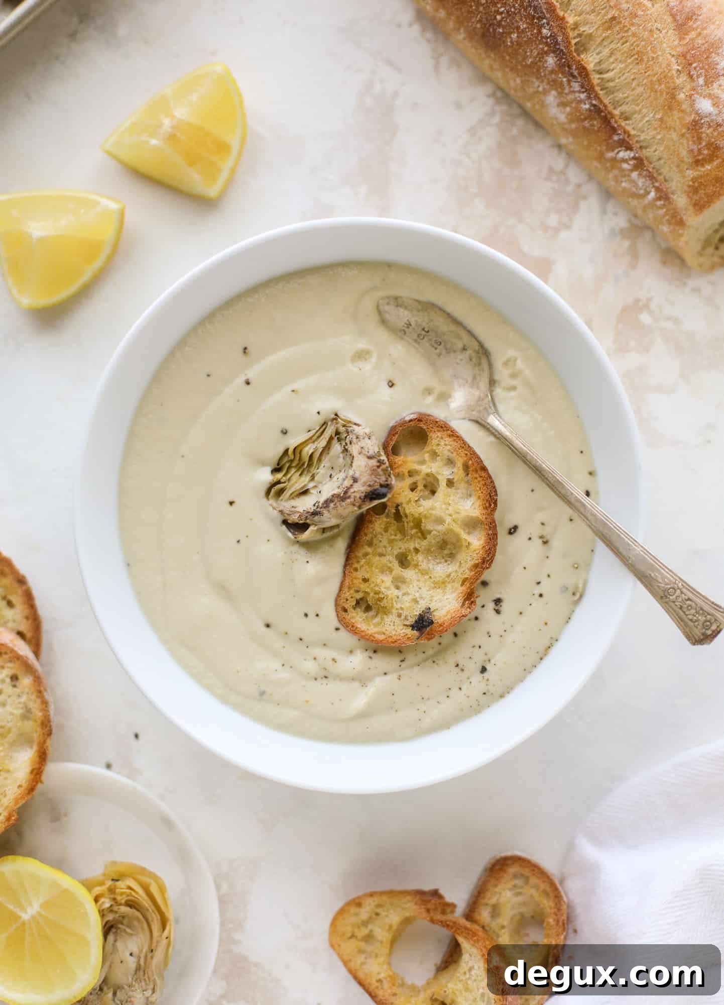 This creamy artichoke soup is full of artichoke hearts, cream and crème fraiche. It's rich and hearty but also light in flavor - perfect for late winter.