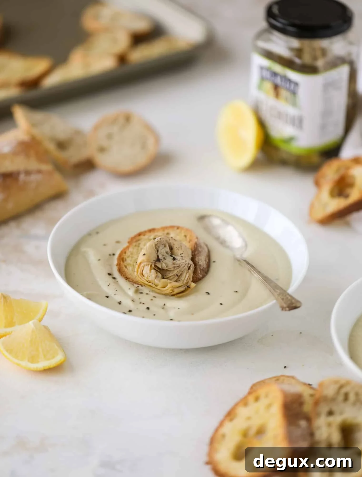 This creamy artichoke soup is full of artichoke hearts, cream and crème fraiche. It's rich and hearty but also light in flavor - perfect for late winter.