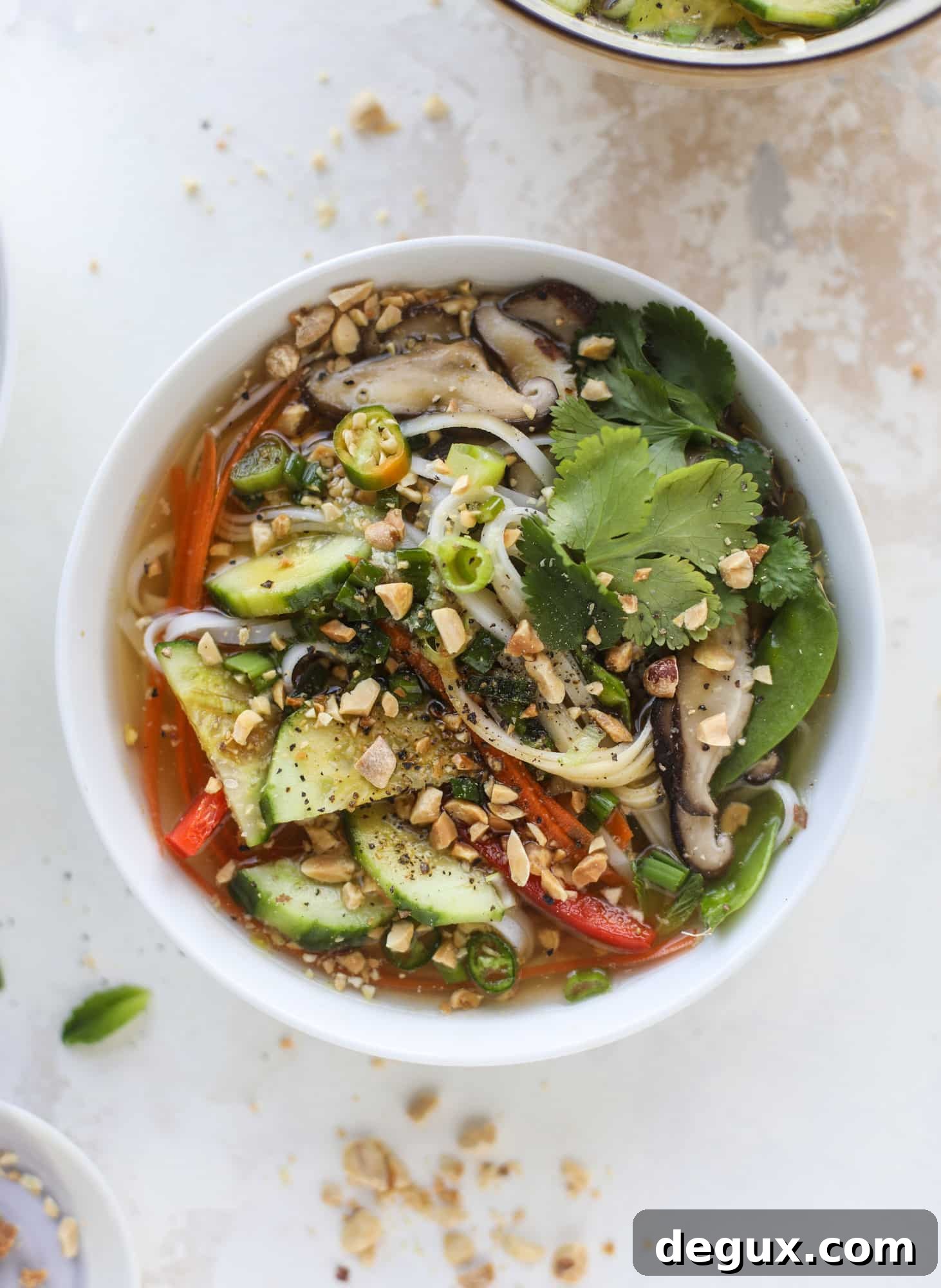 Ginger scallion noodle bowls are a flavorful, comforting vegetarian meal that can be customized to include any veggies you love! I howsweeteats.com #noodle #bowls