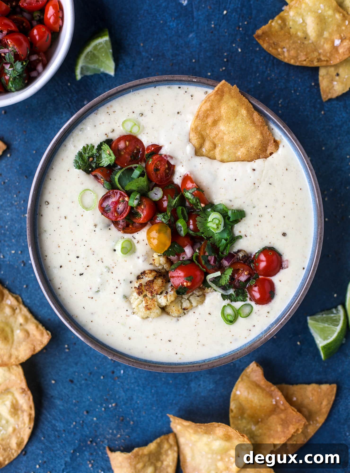 Roasted Cauliflower Queso Recipe: Creamy Vegan Dip for Parties 12 This roasted cauliflower queso has all the deliciousness of regular queso, with roasted cauliflower added in. It's satisfying and tastes like heaven. I howsweeteats.com #cauliflower #queso