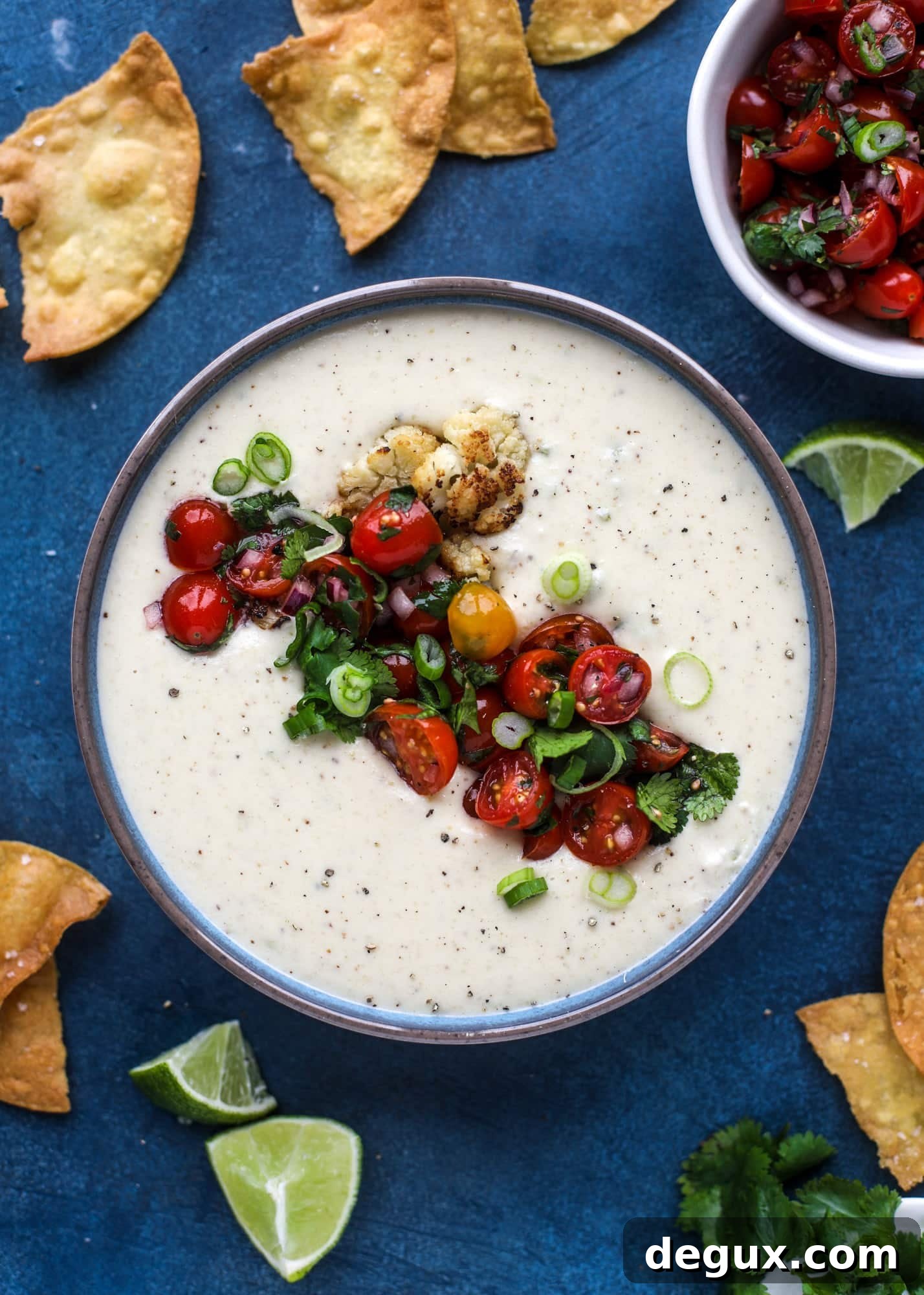 Roasted Cauliflower Queso Recipe: Creamy Vegan Dip for Parties 6 This roasted cauliflower queso has all the deliciousness of regular queso, with roasted cauliflower added in. It's satisfying and tastes like heaven. I howsweeteats.com #cauliflower #queso