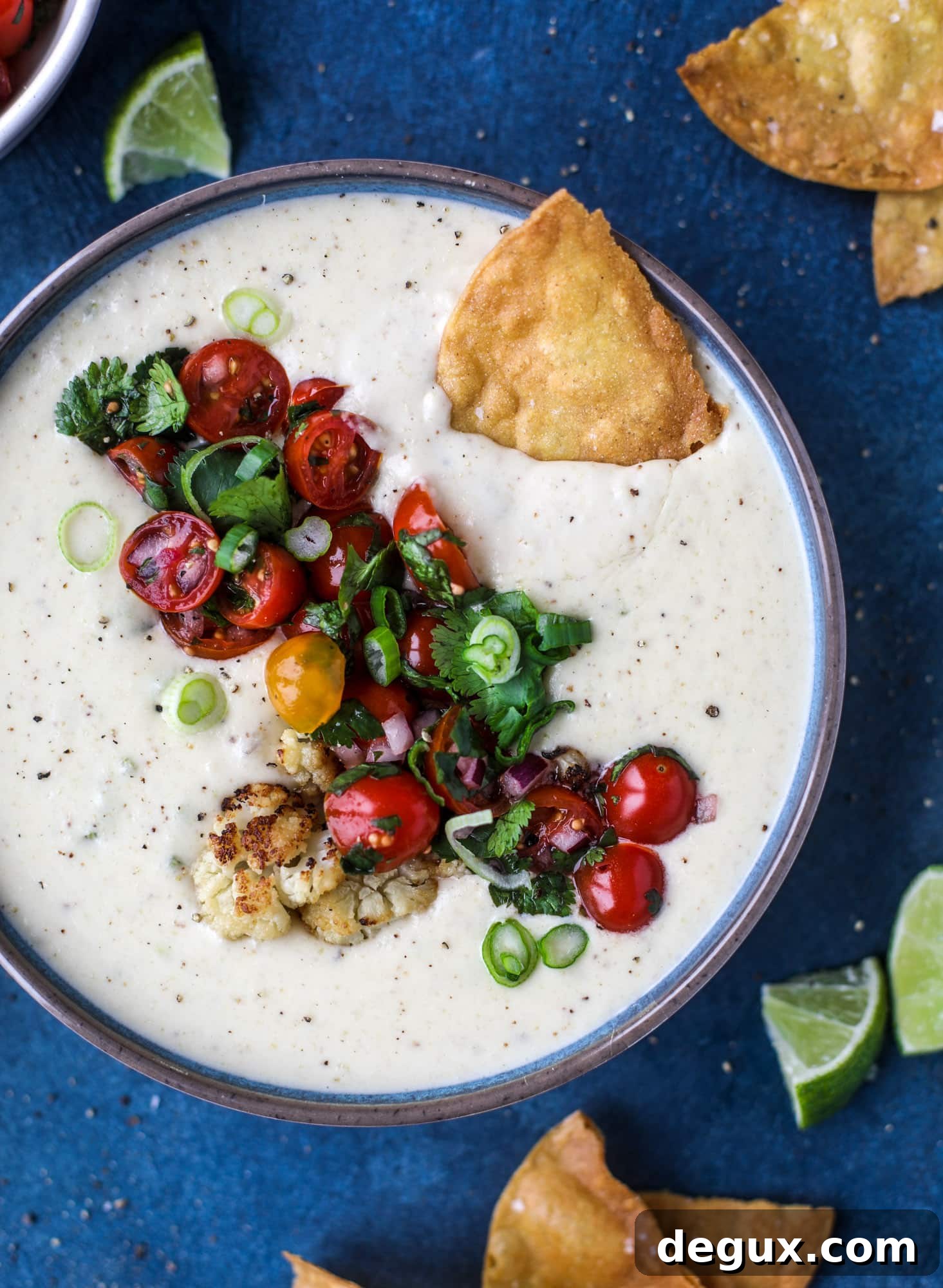 Roasted Cauliflower Queso Recipe: Creamy Vegan Dip for Parties 10 This roasted cauliflower queso has all the deliciousness of regular queso, with roasted cauliflower added in. It's satisfying and tastes like heaven. I howsweeteats.com #cauliflower #queso