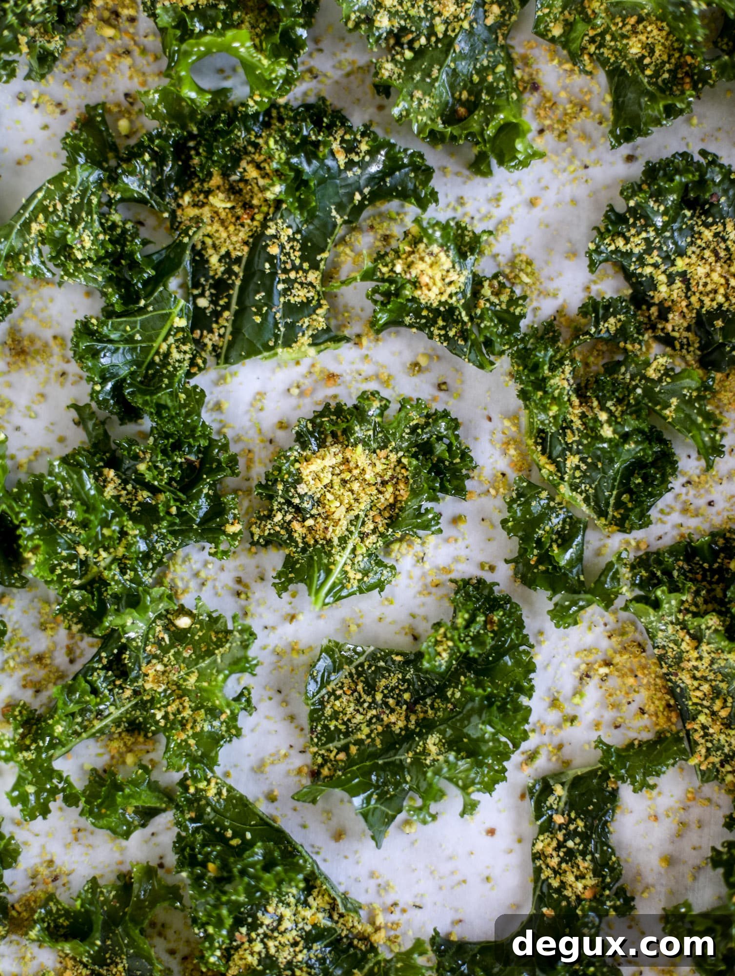 Parmesan Pistachio Kale Chips — Crispy Holiday Side Dish 5 Parmesan pistachio kale chips are an easy and healthy snack - full of nutty, cheesy flavor and crispy like regular chips!