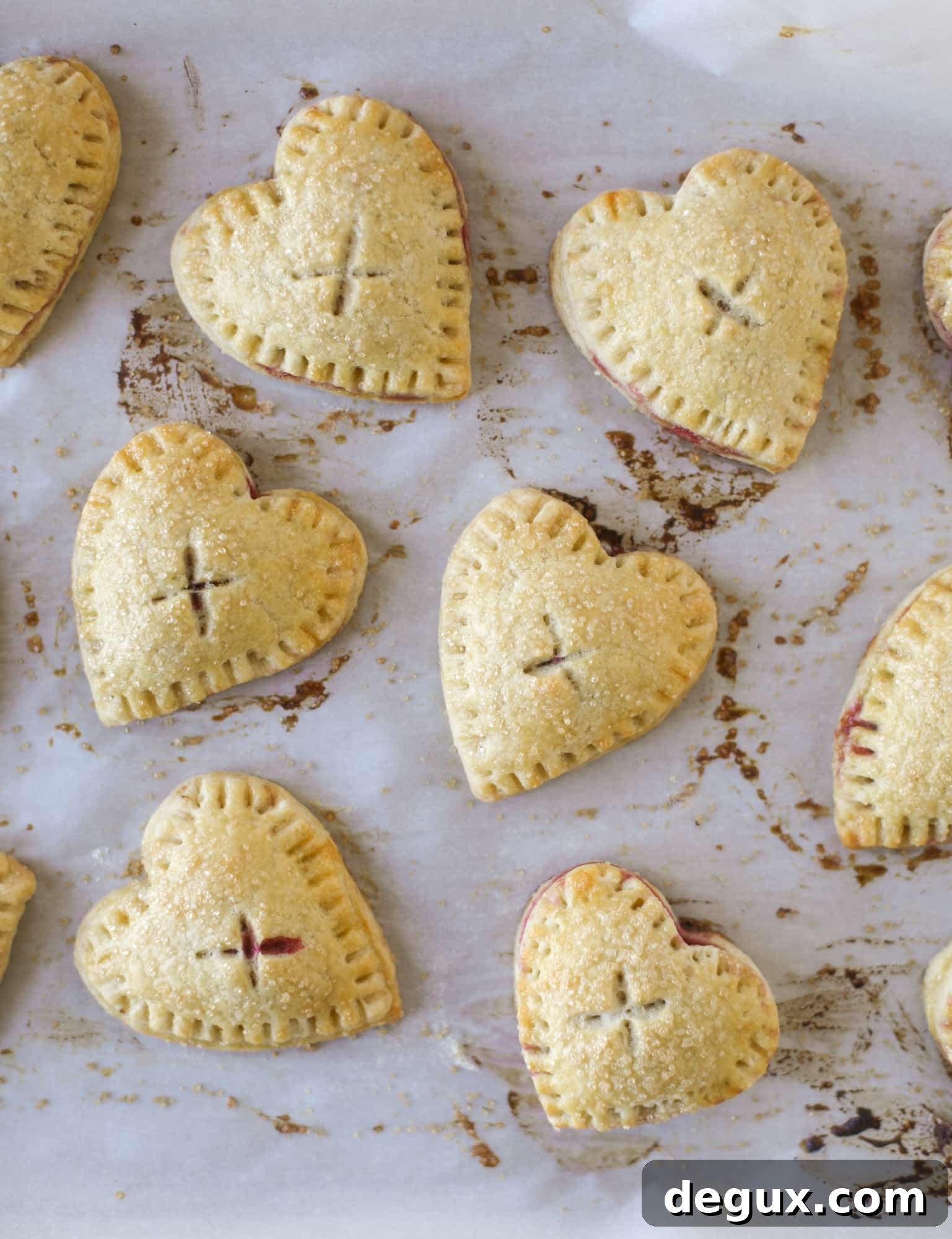 These adorable mini heart pies are filled with a homemade raspberry compote and creamy, chocolatey nutella. So fun and easy to make!