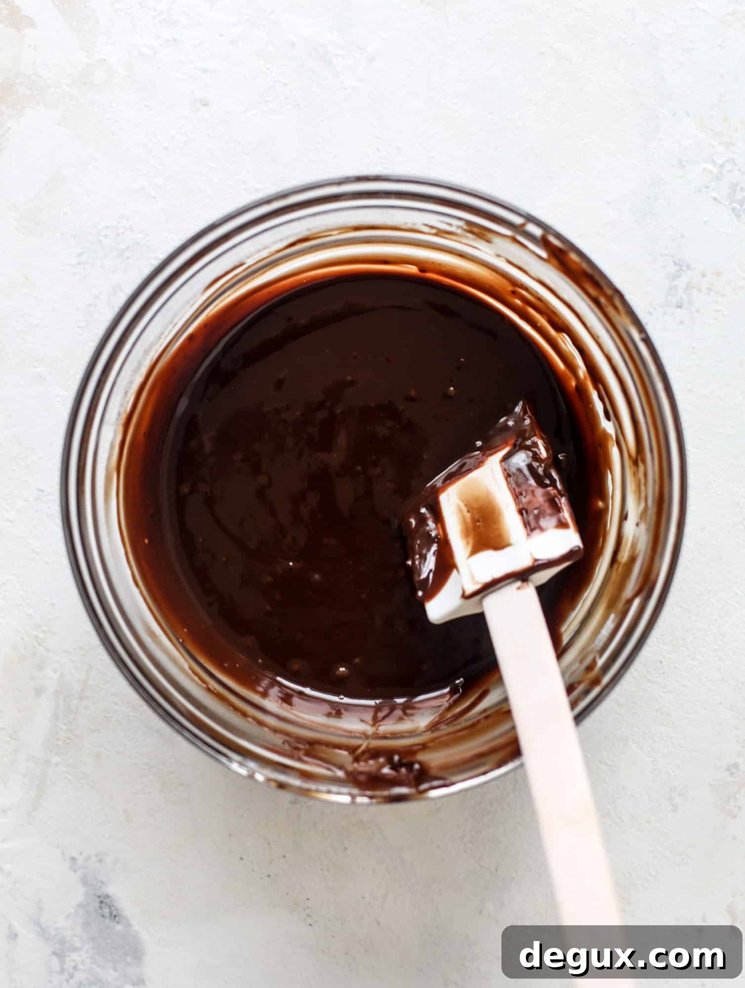 Classic chewy, slightly gooey coconut macaroons dipped in an irish cream chocolate ganache. Easy to make and gluten free too! I howsweeteats.com #irishcream #coconutmacaroons