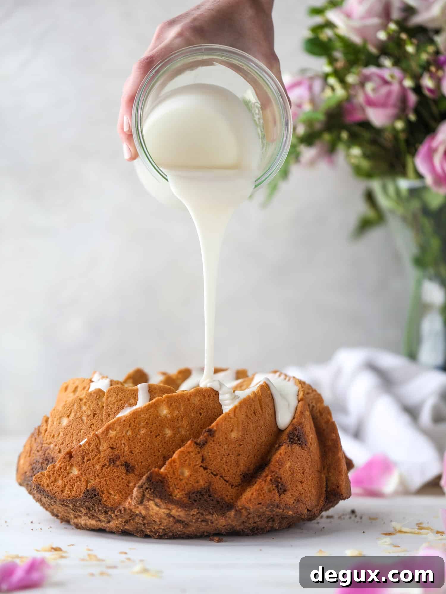 pouring glaze on coffee cake