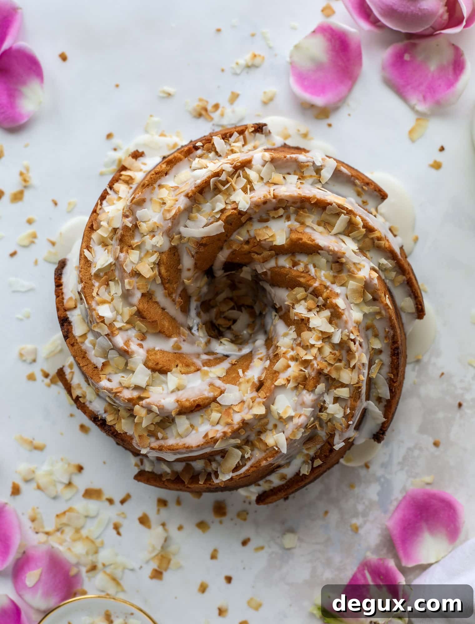 Make breakfast and brunch better with coconut coffee cake! Tender coconut cake with a cocoa sugar streusel and a coconut glaze. To die for!