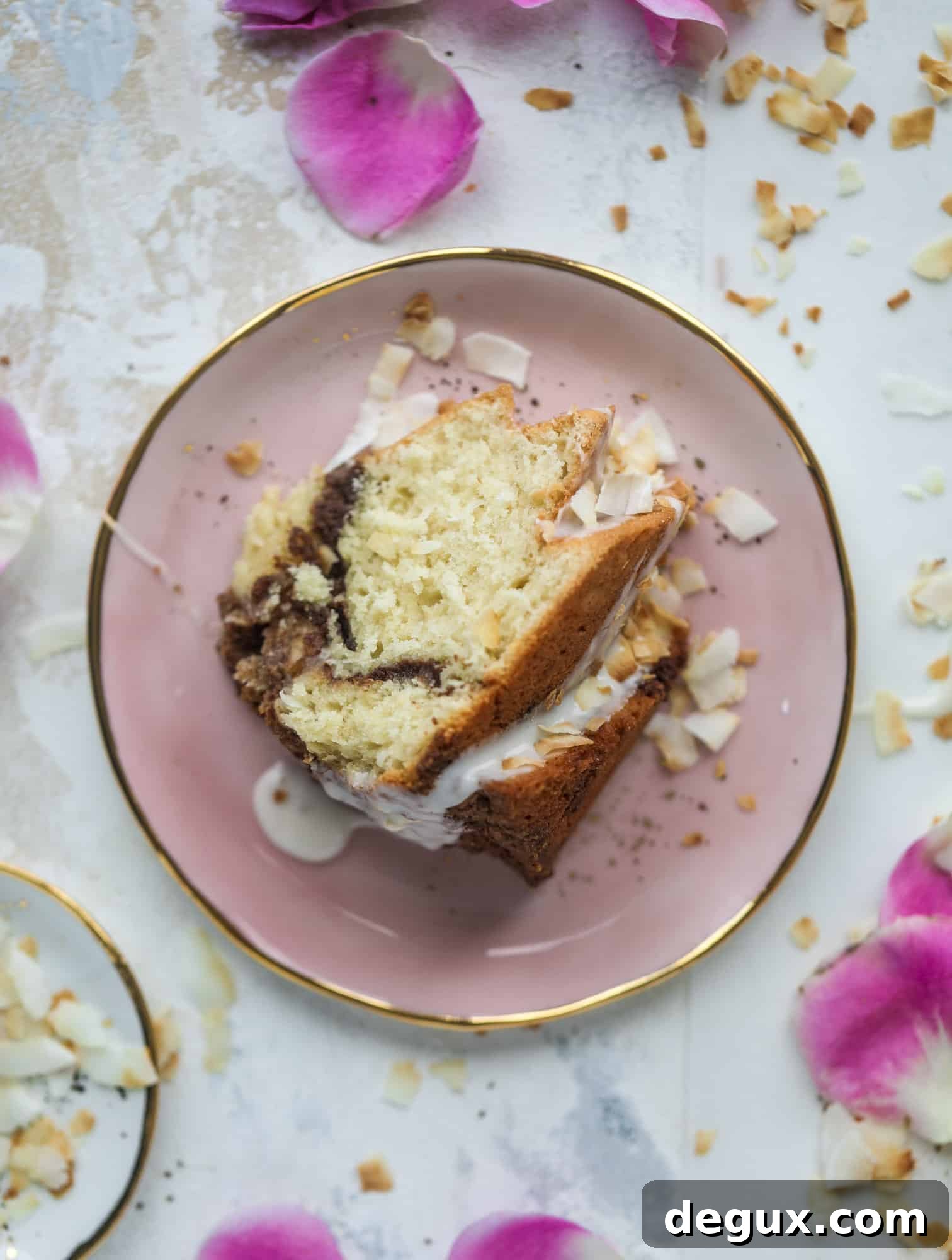 Make breakfast and brunch better with coconut coffee cake! Tender coconut cake with a cocoa sugar streusel and a coconut glaze. To die for!