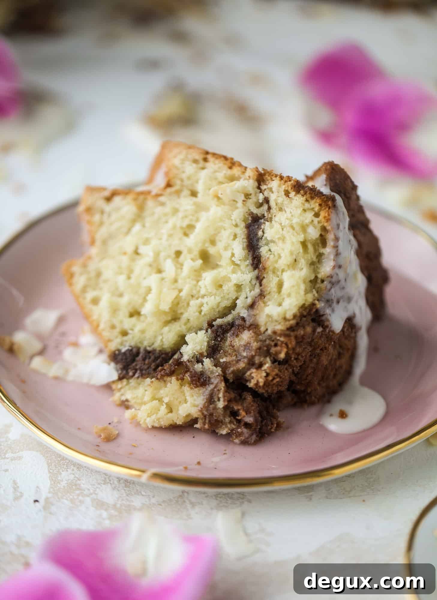 Make breakfast and brunch better with coconut coffee cake! Tender coconut cake with a cocoa sugar streusel and a coconut glaze. To die for!