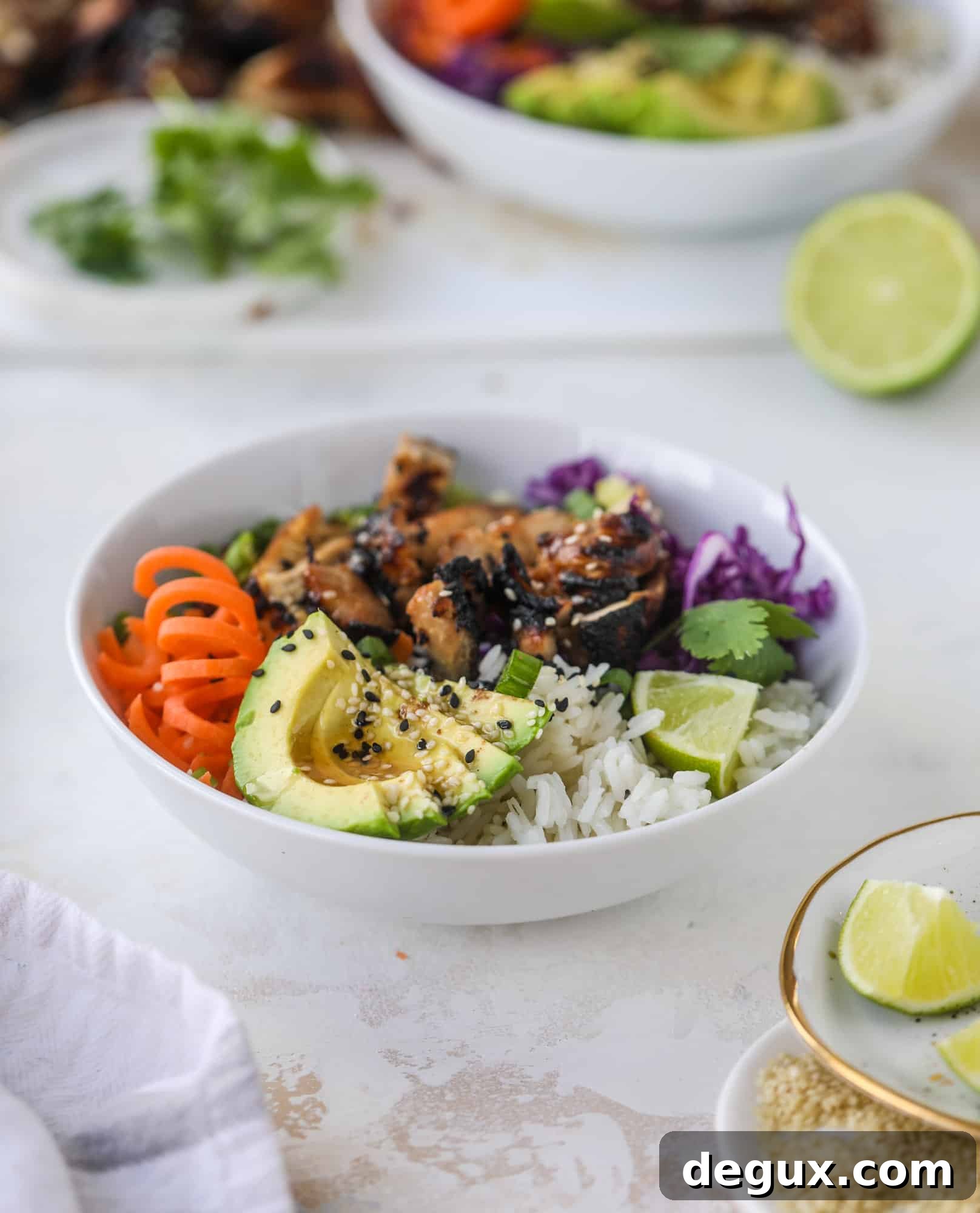 Sesame Soy Chicken with Fragrant Coconut Rice 5 Korean chicken bowls are loaded with flavor: toasted sesame, soy sauce and lime come together over coconut rice and avocado to create a delicious meal! I howsweeteats.com #korean #chicken