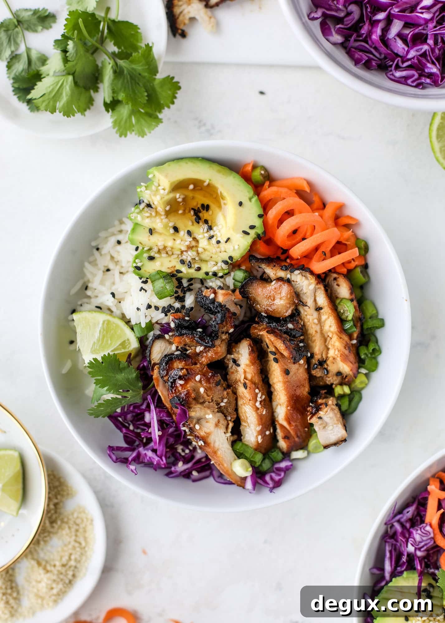 Sesame Soy Chicken with Fragrant Coconut Rice 6 Korean chicken bowls are loaded with flavor: toasted sesame, soy sauce and lime come together over coconut rice and avocado to create a delicious meal! I howsweeteats.com #korean #chicken