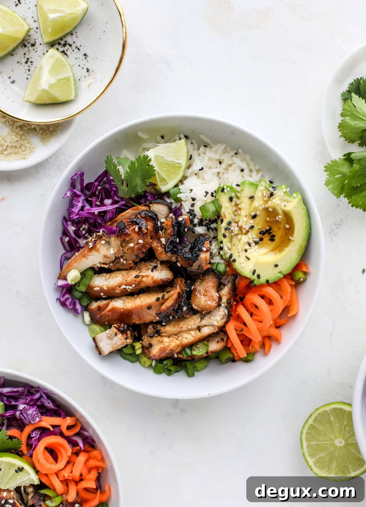 Sesame Soy Chicken with Fragrant Coconut Rice 7 Korean chicken bowls are loaded with flavor: toasted sesame, soy sauce and lime come together over coconut rice and avocado to create a delicious meal! I howsweeteats.com #korean #chicken