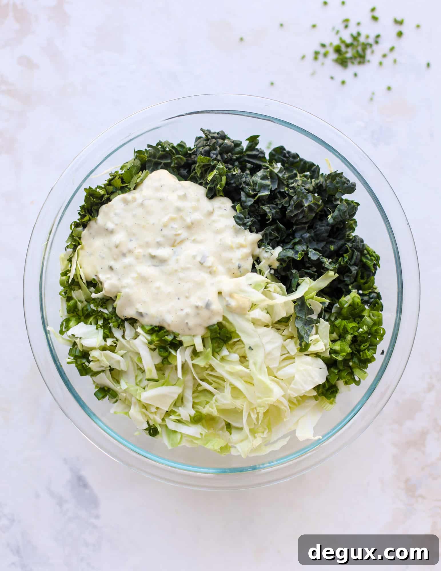 Crispy Fish Sandwich with Kale Coleslaw Recipe 5 A light and crispy fish sandwich made with a simple beer batter and topped with a hearty, creamy kale cole slaw. Loaded with flavor! I howsweeteats.com #crispyfish #sandwich