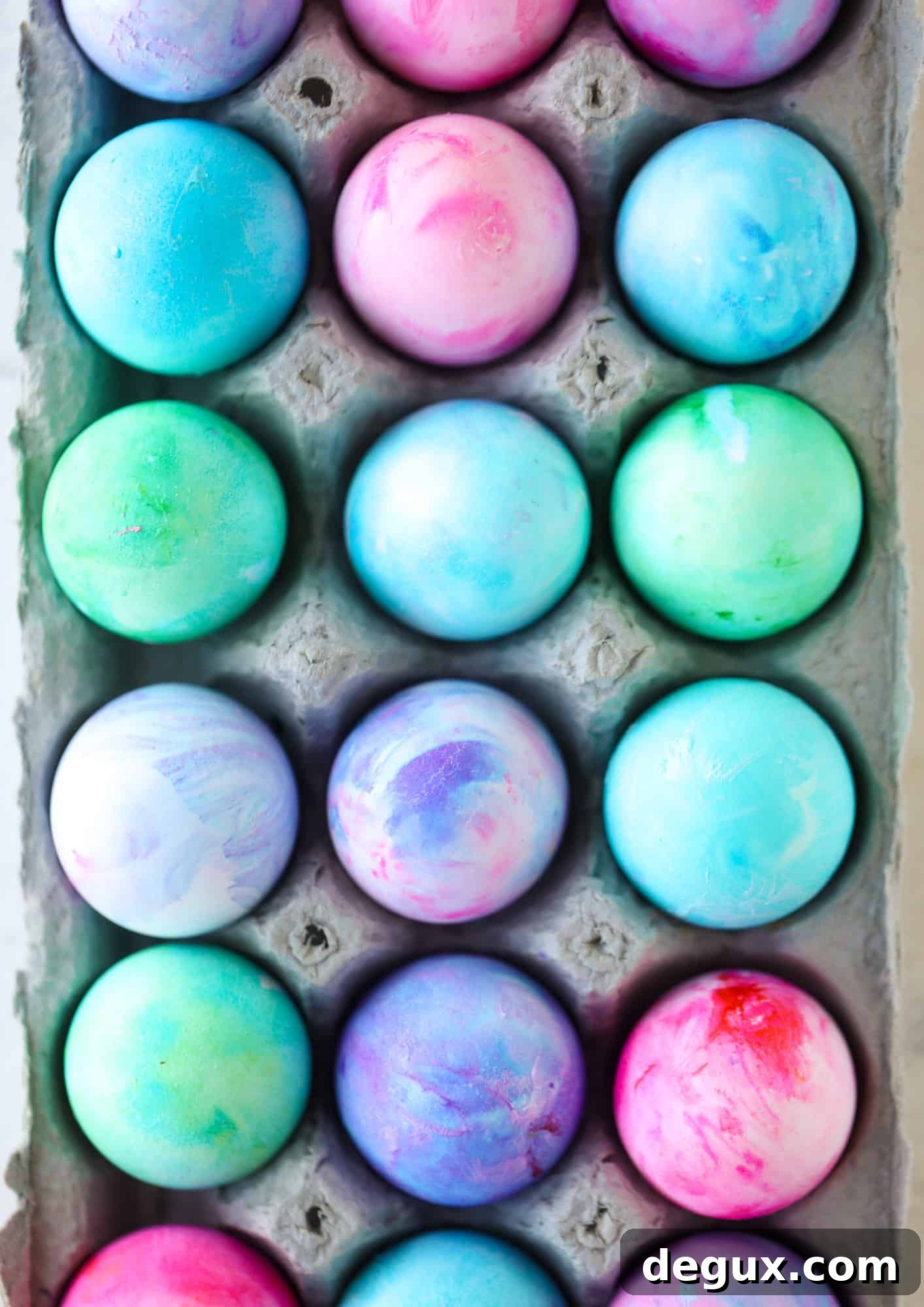 This is how to dye eggs with cool whip! It's so fun, super kid-friendly and ridiculously easy too. I love using this method to make unicorn eggs!