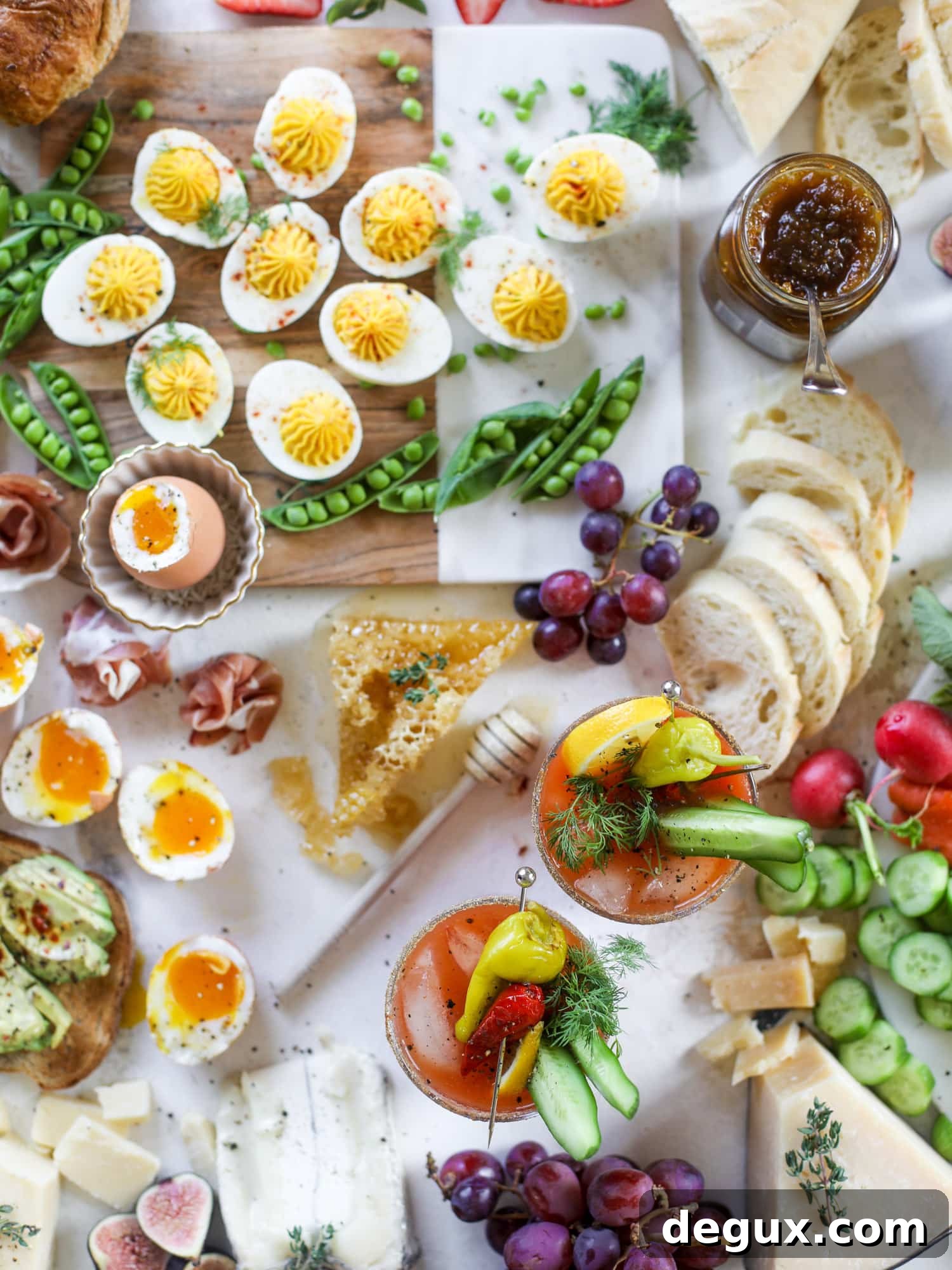 Build an Easter Brunch Board with Calabrian Chili Bloody Marys 2 The highlight of this Easter brunch board are the deviled eggs and soft boiled eggs! Add some avocado toast, donuts and bloody marys and you've arrived. I howsweeteats.com #brunch #board