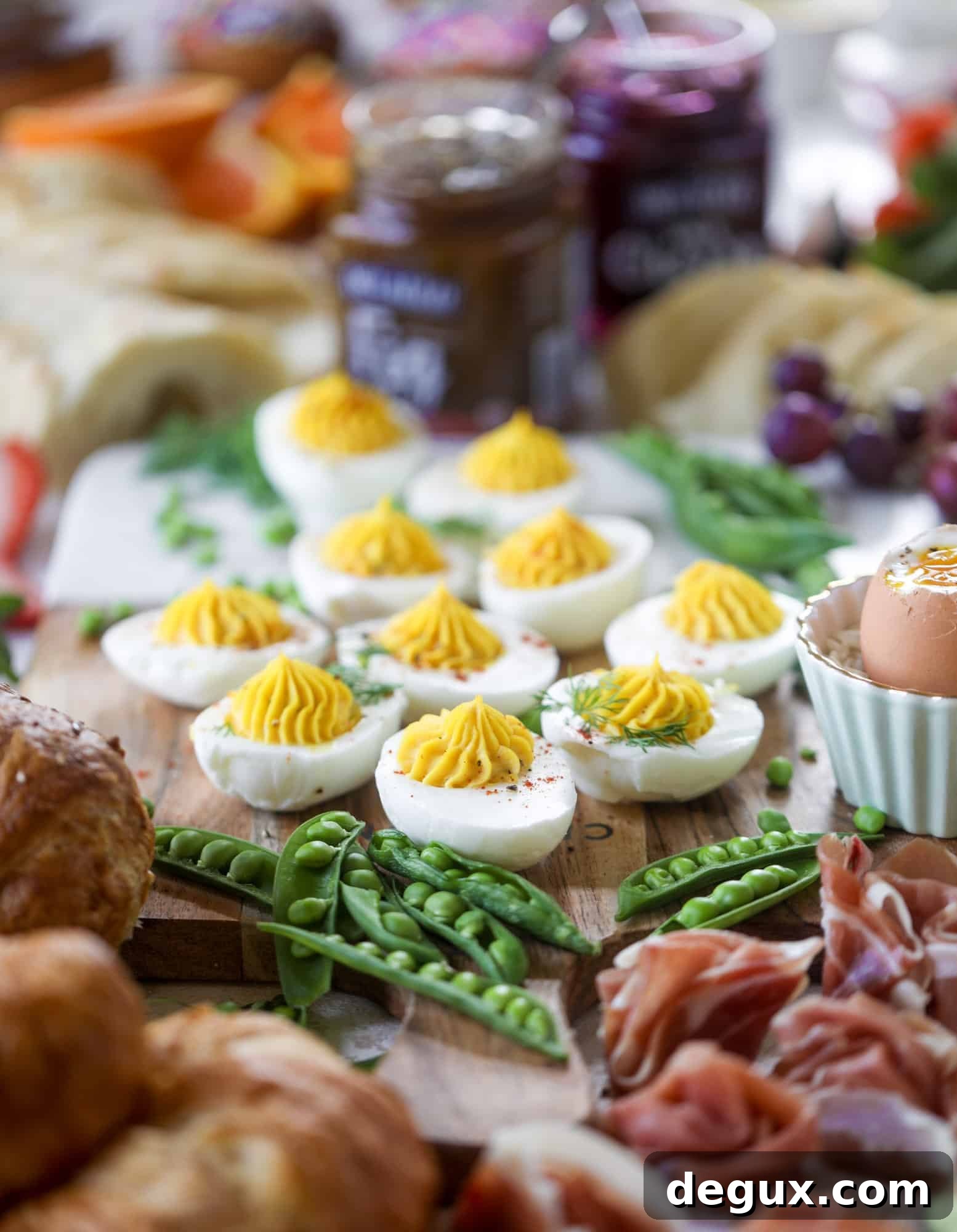Build an Easter Brunch Board with Calabrian Chili Bloody Marys 3 The highlight of this Easter brunch board are the deviled eggs and soft boiled eggs! Add some avocado toast, donuts and bloody marys and you've arrived. I howsweeteats.com #brunch #board