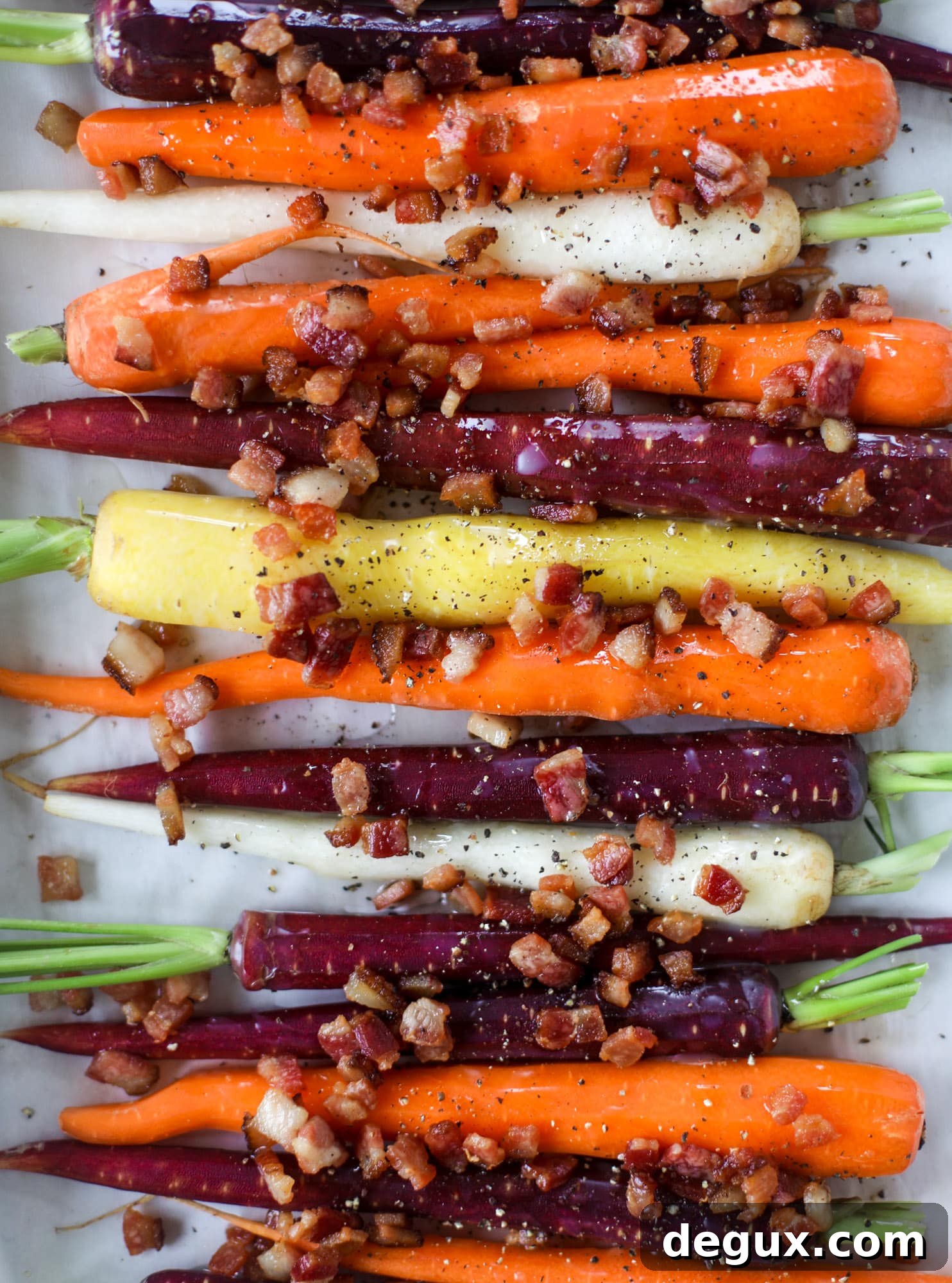Bacon-Roasted Carrots: Weekend Side Dish Recipe 5 Sweet carrots are drizzled with bacon fat and chopped bacon, then roasted until they are tender, sweet and caramely. So much flavor!