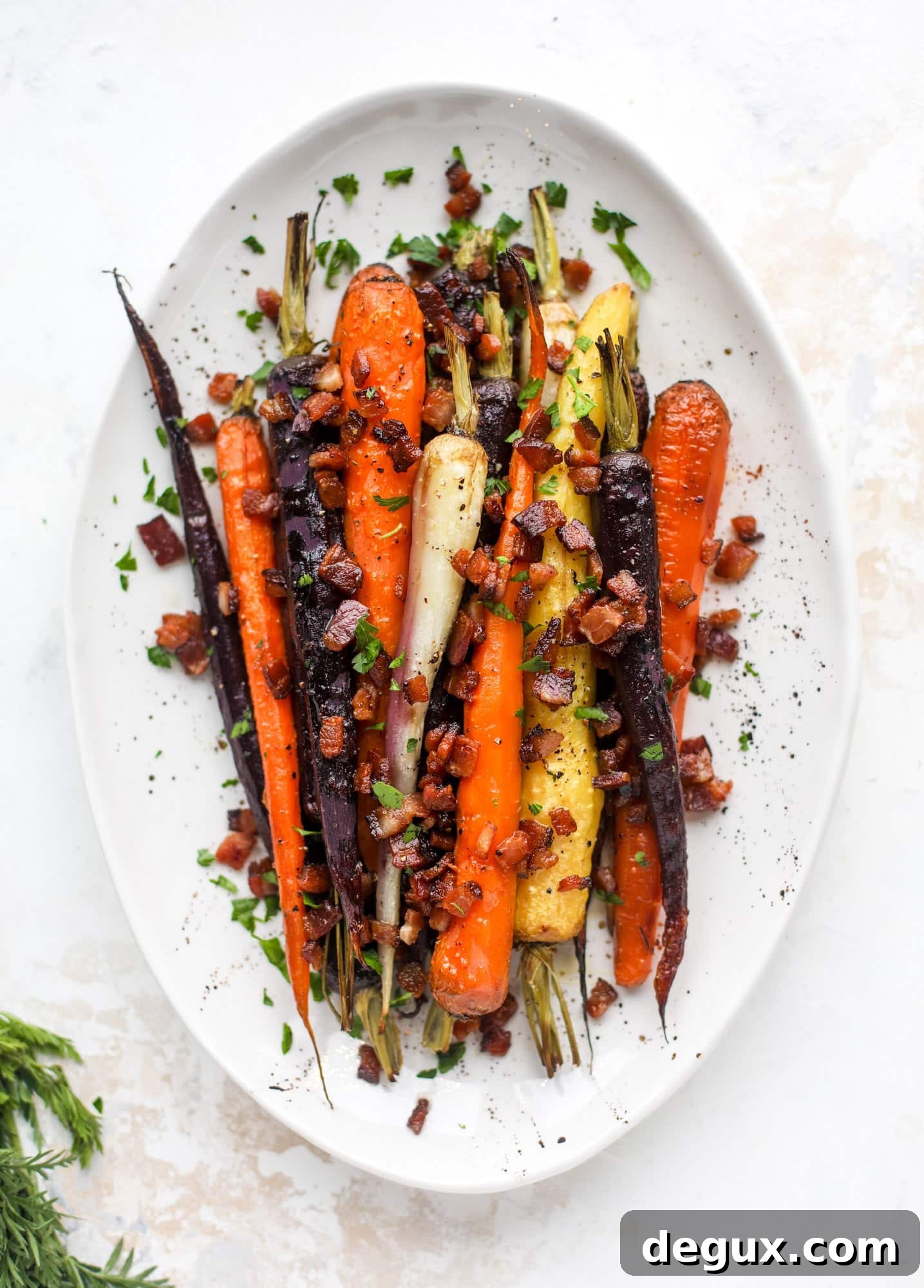 Bacon-Roasted Carrots: Weekend Side Dish Recipe 6 Sweet carrots are drizzled with bacon fat and chopped bacon, then roasted until they are tender, sweet and caramely. So much flavor!