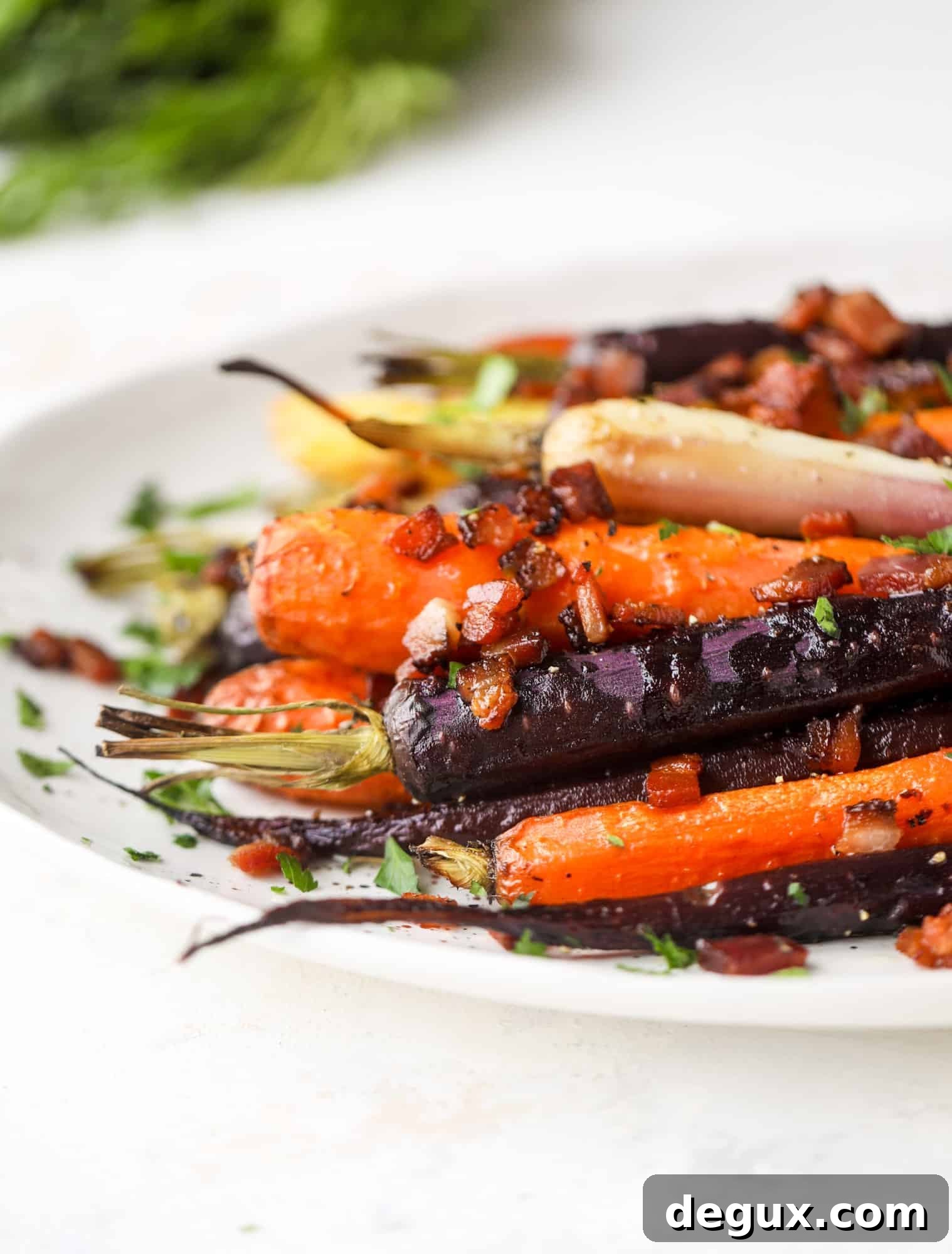 Bacon-Roasted Carrots: Weekend Side Dish Recipe 8 Sweet carrots are drizzled with bacon fat and chopped bacon, then roasted until they are tender, sweet and caramely. So much flavor!