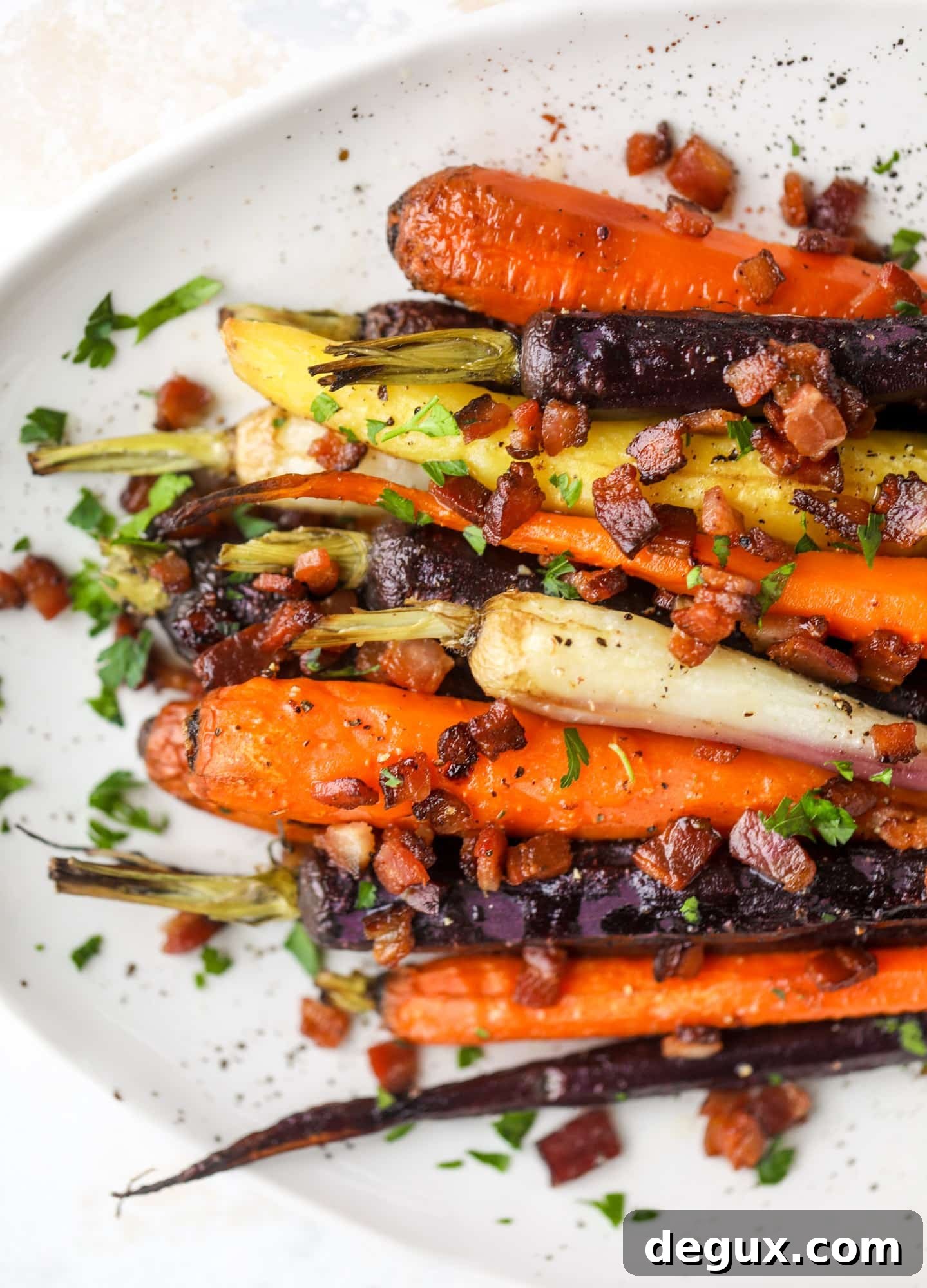 Bacon-Roasted Carrots: Weekend Side Dish Recipe 9 Sweet carrots are drizzled with bacon fat and chopped bacon, then roasted until they are tender, sweet and caramely. So much flavor!